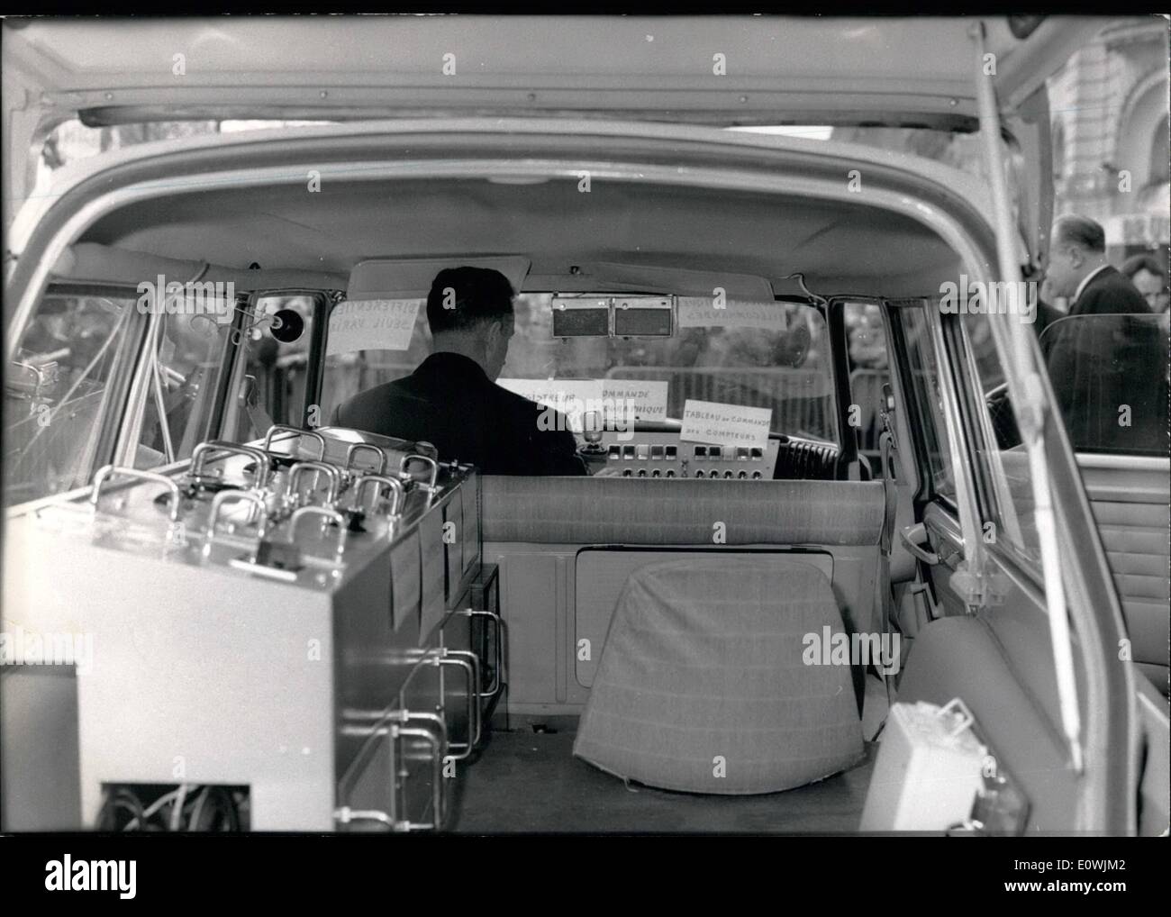 Mar. 03, 1963 - A test car to control drivers infractions ; A specially designed car has been offered to-day to Mr. Jacquet French minister of public works. The car possess the latest electronic perfection to detect the defections of drivers on the road and to make a study afterwards to eliminate them. It is hoped that the number of accidents will be reduced after conclusions. However it is teed promised that caught drivers records will not be passed over to the police. photo shows General inside view of the car. Stock Photo