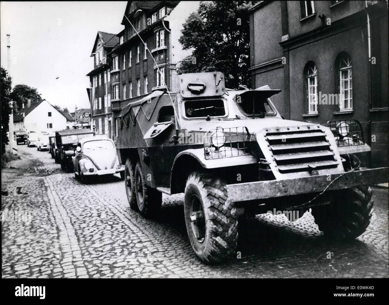 Jun. 06, 1963 - East german soldiers flee to west in armored patrol car: Three soldiers of communist east german army broke through the barbed wire frontier at the zone border near Bad Versfeld just at the time when soviet premier Chruchtschow landed in East Berling for a one weeks visit to communist ruled east germany. After the break-through, the three refugees handed themselves and their armored vehicle to the west German border police at Heringen, from where they were taken to Bad Versfeld. The armored car was driven by a west German border police man Stock Photo