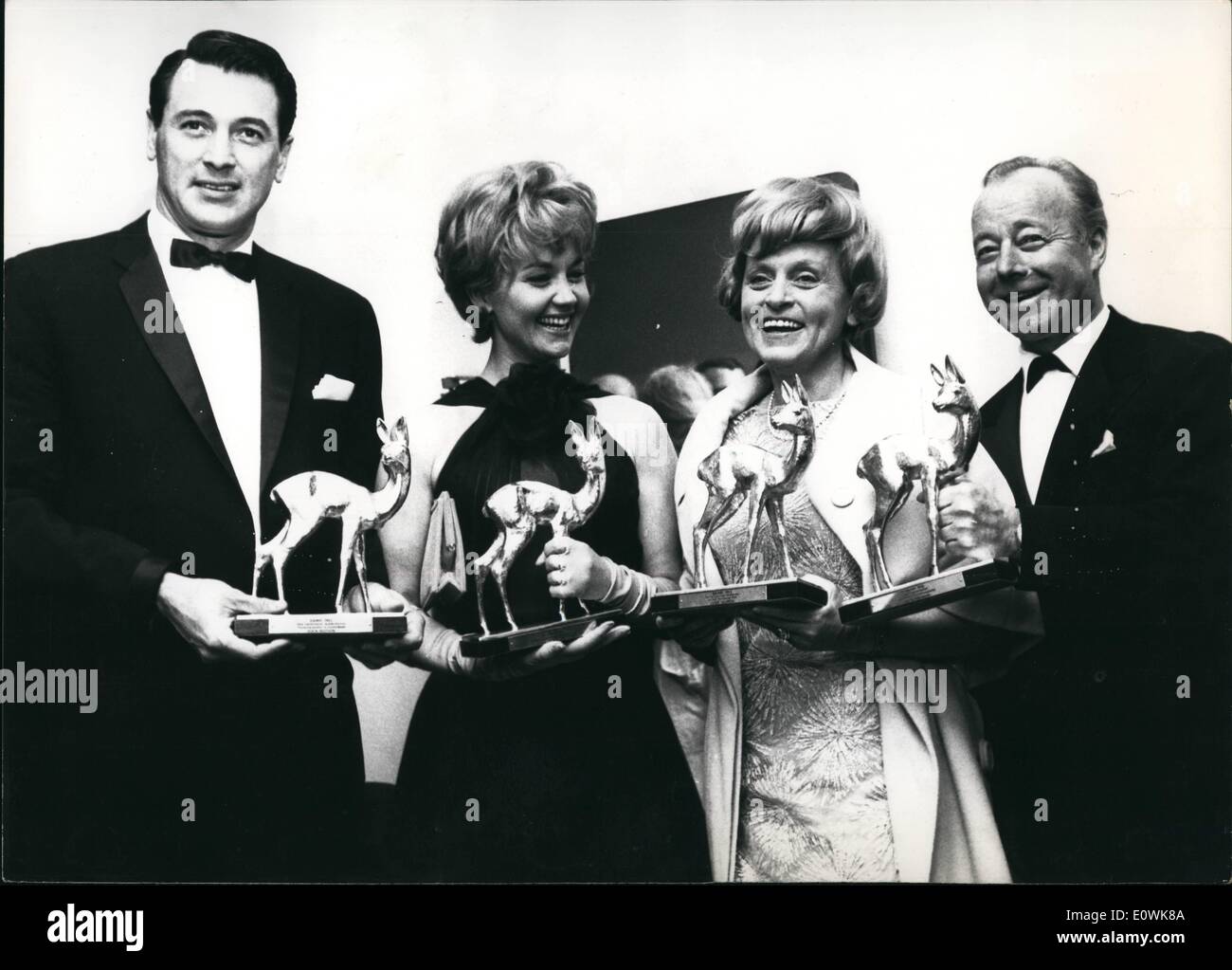 Apr. 04, 1963 - Bambi-film prizes awarded in Karlsruhe: The traditional german film prizes Bambi were presented to the winners of this years poll today in the Schwarz - waldhalle at Karlsruhe, Germany today. The winners of this year are (from left) Rock Hudson USA; Lieselotte Pulver, Switzerland Luise Ulrich and Heinz Ruhmann )( (both Germany) Stock Photo