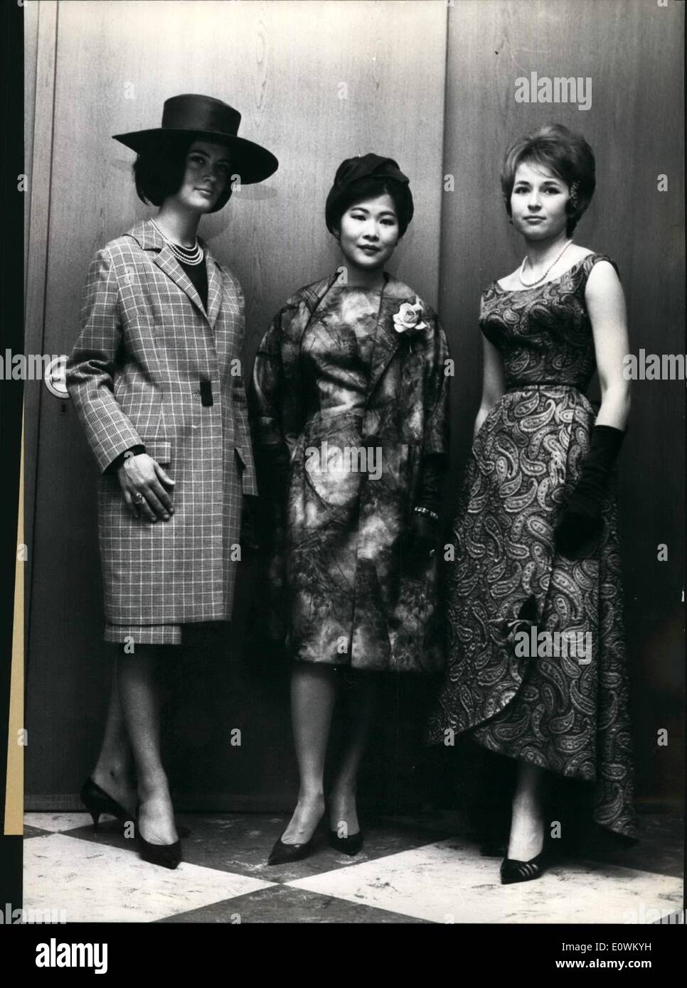 May 05, 1963 - Europe's top Amateur dressmakers. met in Frankfurt, Germany, for the final of the Competition of ''Needle Princess Europe 1963''. the winners of the national competitions from all European Countries presented the finest dresses they had Taylored at home. Awarded with the first price was Mrs. Aruni Winkel-Wasuwong, a born thai who lives in the Nether lands. she presented a selfmade complet to the jury(center). second place was given to Mrs Stock Photo