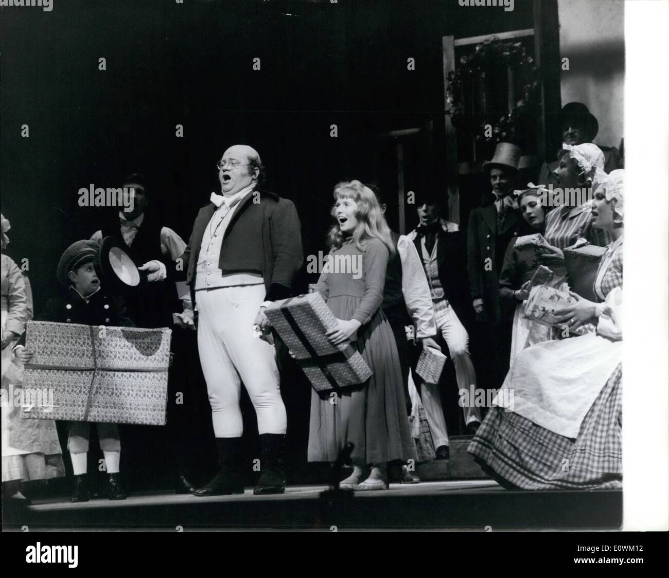 Jul. 07, 1963 - Harry Secombe Rehearses ''Pickwick''..: Popular singer - Comedian -Harry Secombe is now rehearsing for the title role in the 0,000 musical ''Pickwick'' - based on the Charles Dickens ''Pickwick Papers''.. The show opens at the Seville Theatre on Thursday. Photo Shows Harry Secombe as Mr. Pickwick, sings during the Christmas scene. Stock Photo