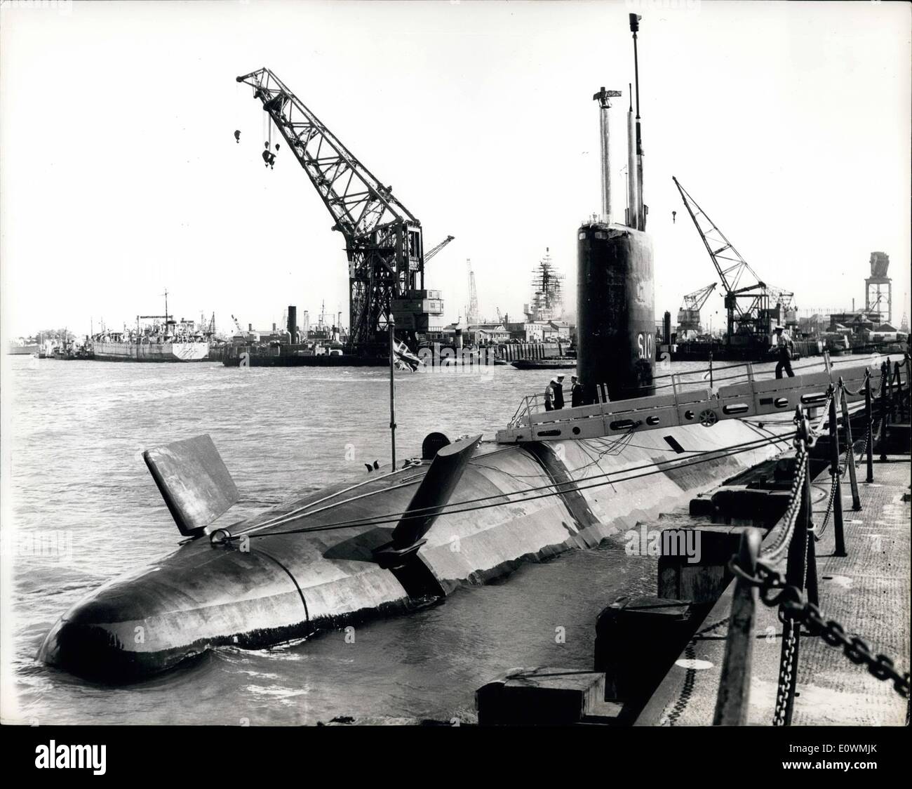 Sep. 09, 1963 - Deadnought at Sea; Britain's first nuclear powered submarine , ''Dreadnaught'' was exercising in the English Channel yesterday. Photo Shows The ''Dreadnaught'' nuclear powered submarine seen at another at Portsmouth, The large Hydroplane fine can be seen at the bows. Stock Photo