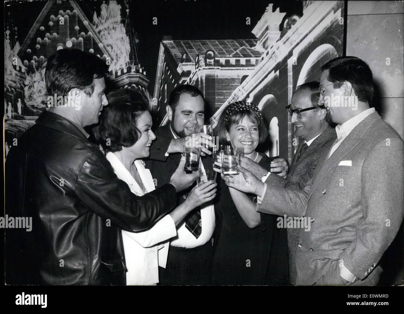 Aug. 08, 1963 - ''Whisky mit Sofa'': Is the German title of the newest film with Maria Schell. Under this motto the leading characters of the film have met on the birthday- party of producer Gunther Grawert. The Party took place at Geiselgasteig (Munich). Picture Shows: (L to R) Karl Michael Vogler, Nadja Gray, Birthday- child Gunther Grawert, Maria Schell, producer producer Dr. Hans Christian Rohardt and Robert Graf. Stock Photo