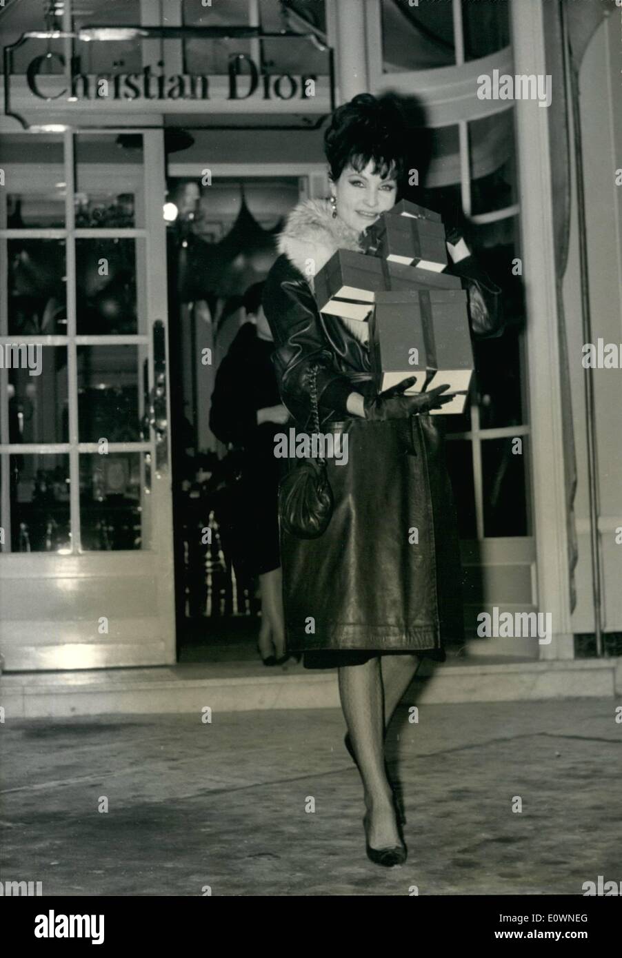 Dec. 12, 1963 - Christmas Shopping for Yvonne Furneaux: English-born movie star Yvonne Furneaux (she is a success in the Italian Cinema) was in Paris to do some Christmas shopping before leaving town for Rome where she is scheduled to start a new picture. Photo Shows Lovely Yvonne Furneaux with a lot of girls for her many friends. Stock Photo