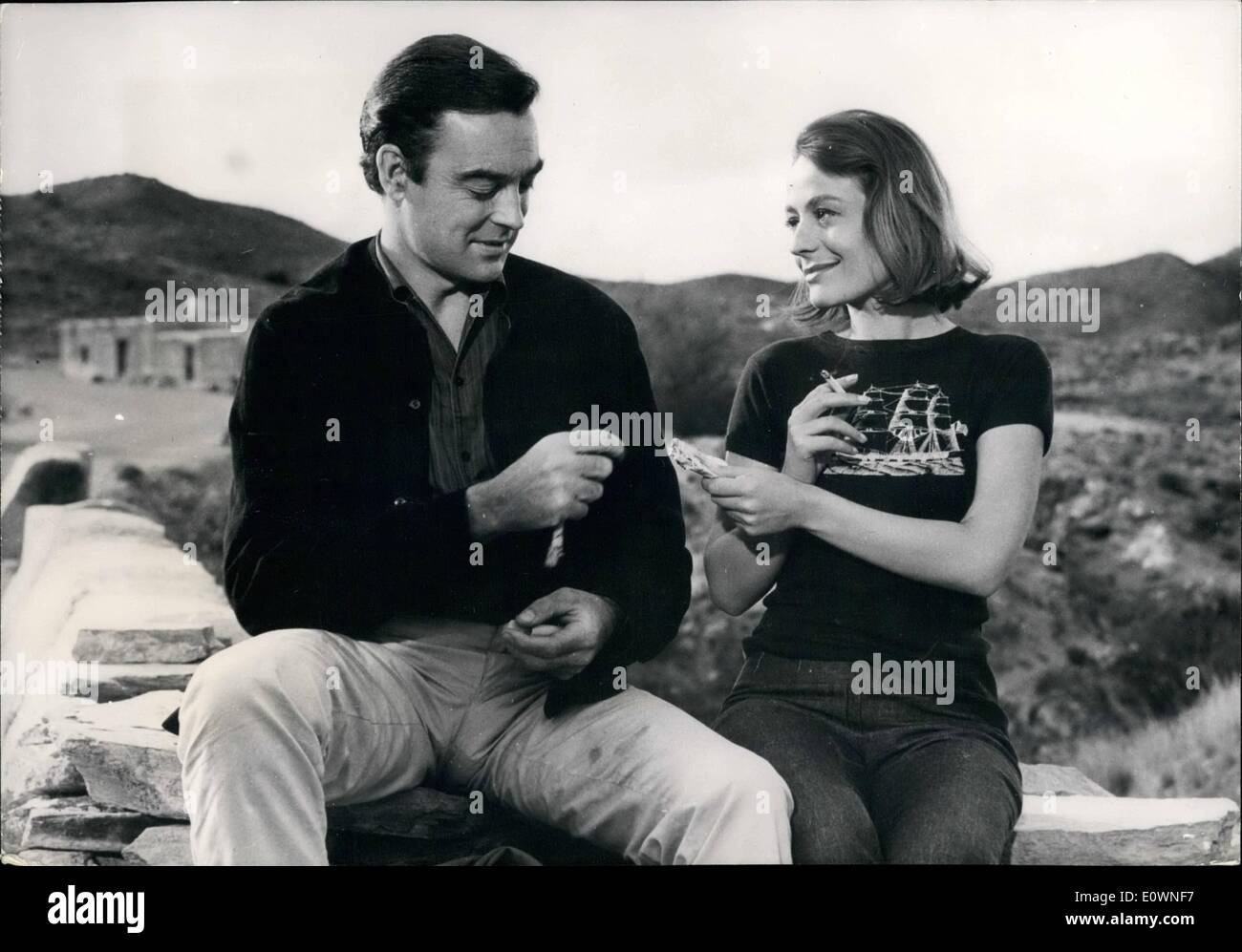Dec. 12, 1963 - Richard Johnson and Annie Girardot Shooting together in Spain.:French film-director woman's'', adapted from a novel by Maria Luisa Linares, in Spain and in which British actor Richard Johnson and France's Annie Girardot will co-star. Photo shows Richard Johnson and Annie Girardot in a scene of the other woman' Stock Photo