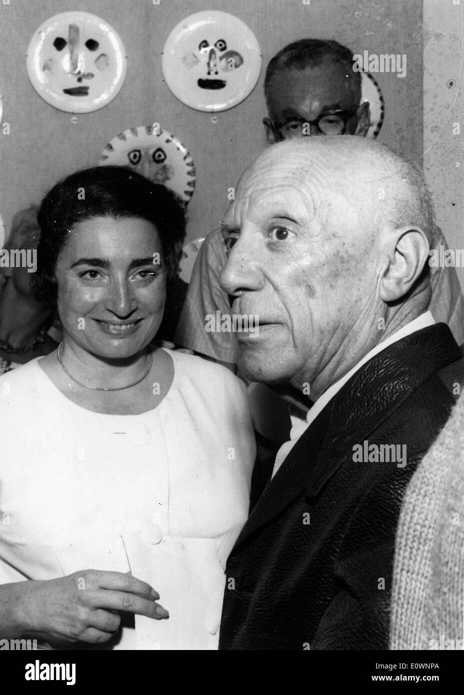 Artist Pablo Picasso with wife Jacqueline Roque at an art opening