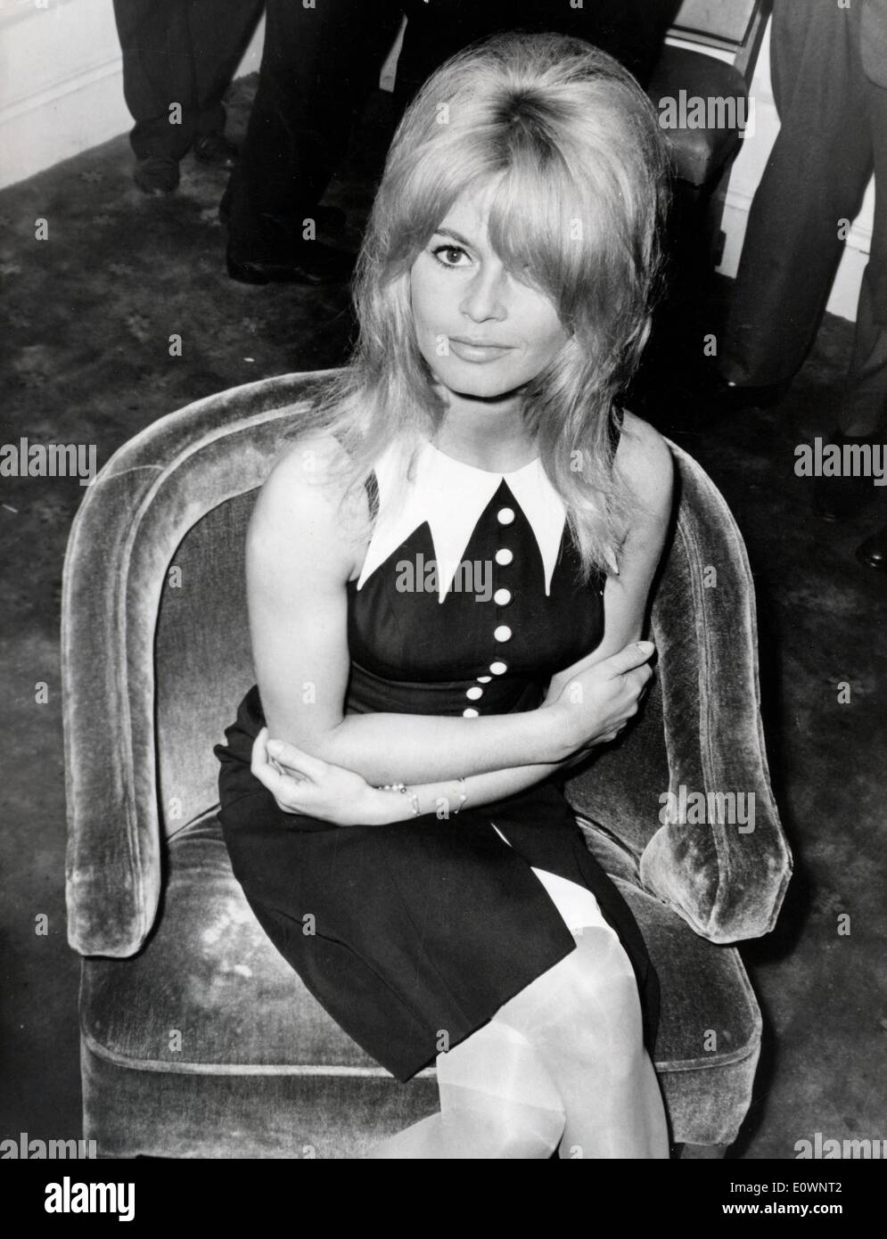 Portrait of actress Brigitte Bardot sitting down Stock Photo