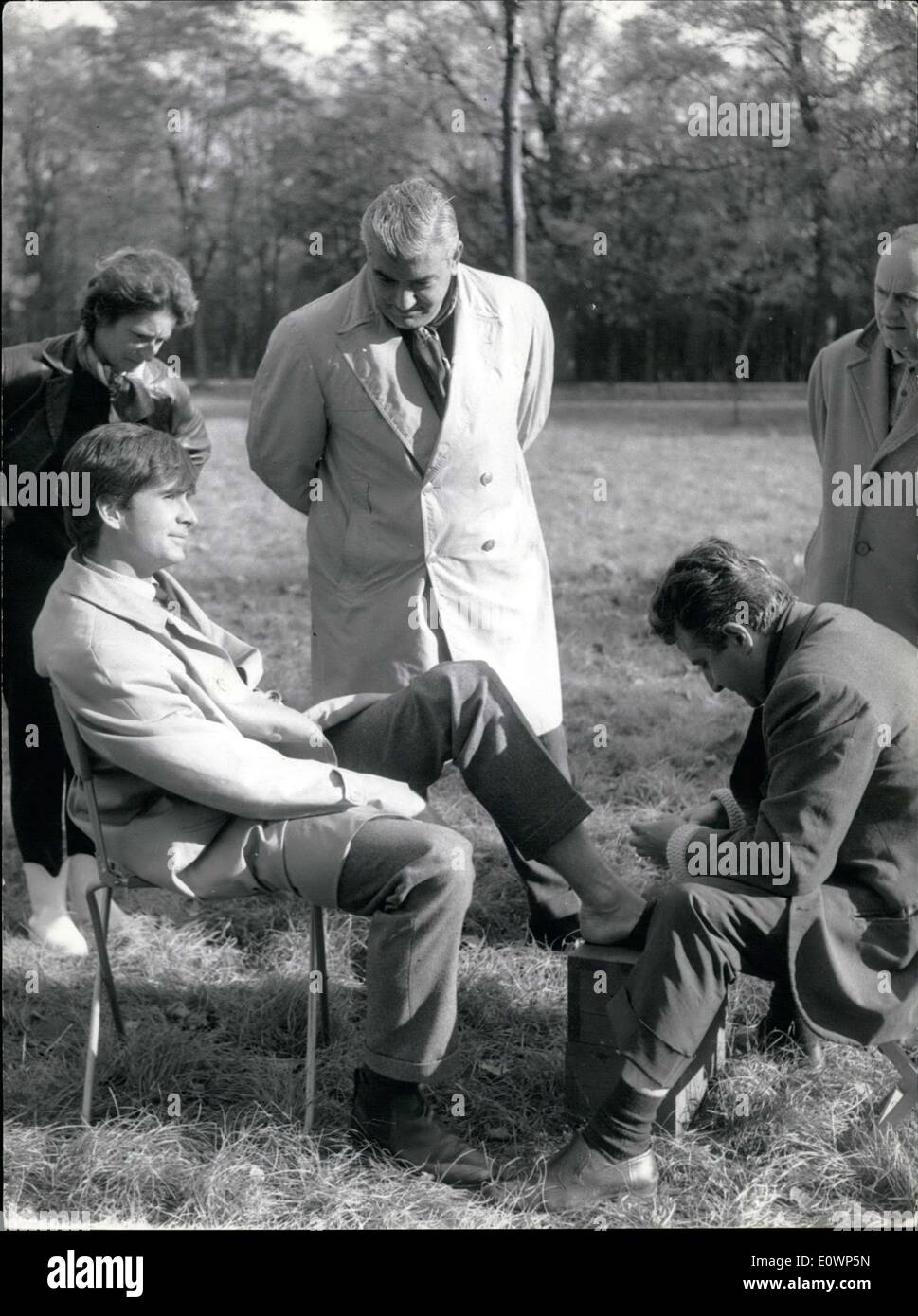 Nov. 03, 1963 - He sprained his ankle while filming ''A Ravishing Idiot'' in Saint Cloud Park. Ardan is the movie's producer. Stock Photo