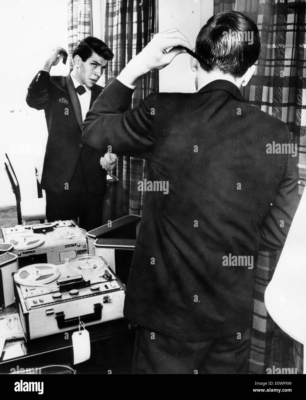 Singer Frank Sinatra Jr. gets ready for a show while on tour Stock Photo