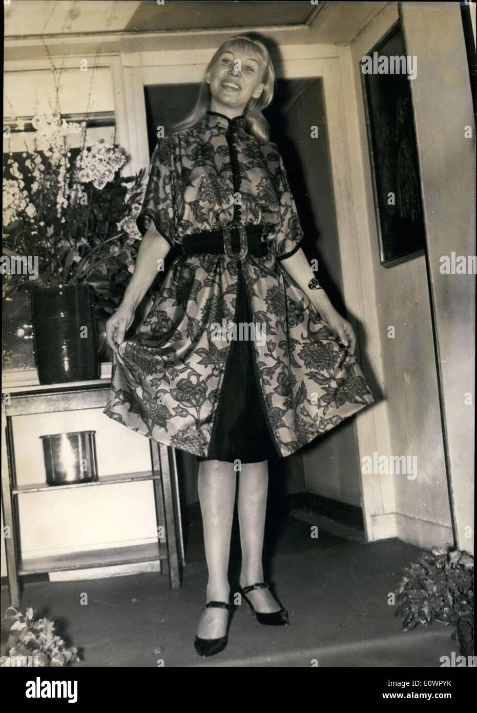 Feb. 01, 1964 - Sylvia Monfort, model of the day, wearing a ravishing cocktail dress from Lola Prusac's 1964 spring and summer collection. Monfort is a friend and client of Prusac. All of the designs that she presented were named after her plays. Stock Photo