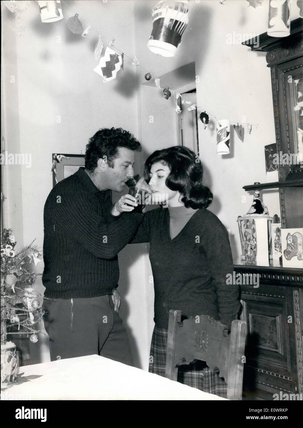 Dec. 12, 1963 - Frank Wolff, the Italo-american actor who became one of leading Italian cinema new actors for his role in ''Processo di Verona'' will wait the New Year at home with her young wife. He wishes a good and Happy 1964. Stock Photo
