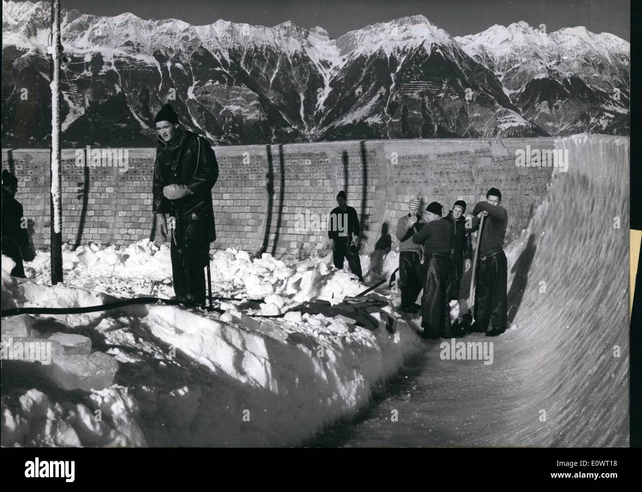 Dec. 12, 1963 - During these days: the Olympia-bob-sleigh-run will be prepared for the coming Olympic Games. Formed by a machine are the 40 x 40 cm ice-bricks, by which the bob-sleigh-run of lgls (Innsbruck) will be brought in form; they are cemented by snow-water. Stock Photo