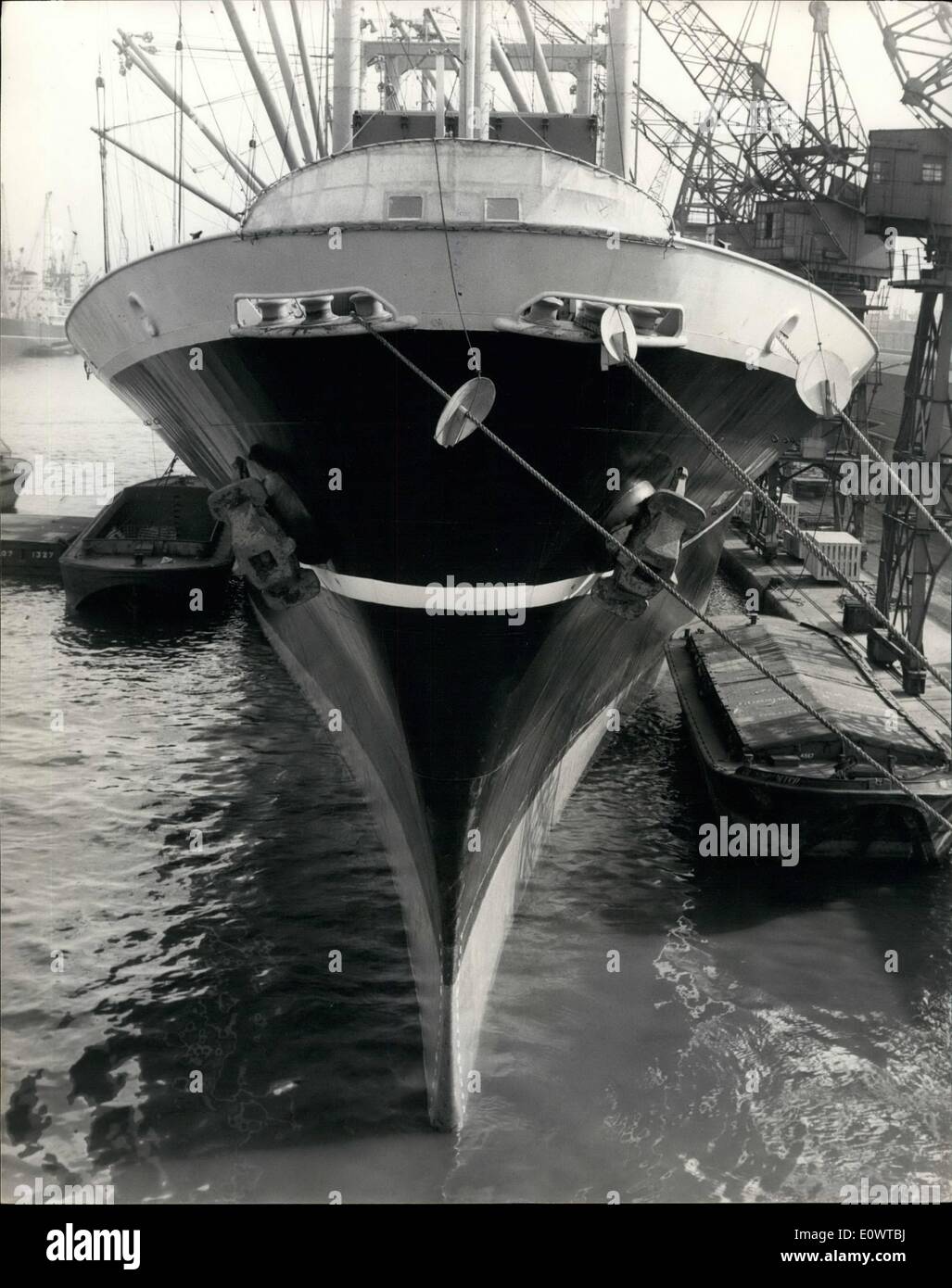 Feb. 27, 1964 - 27-2-64 The ship with the controversial bottom. A recent arrival at the London docks is the new Japanese cargo ship the Yamashiro Maru which has completed her maiden voyage from Kobe. The ship, which was built by Mitsubishi of Nagasaki, has a broad beam, a bulbous bow, and a slender stem and stern. The builders claim that the characteristics which have been developed after years of research, give her more knots on less fuel than a conventional ship's hull Stock Photo