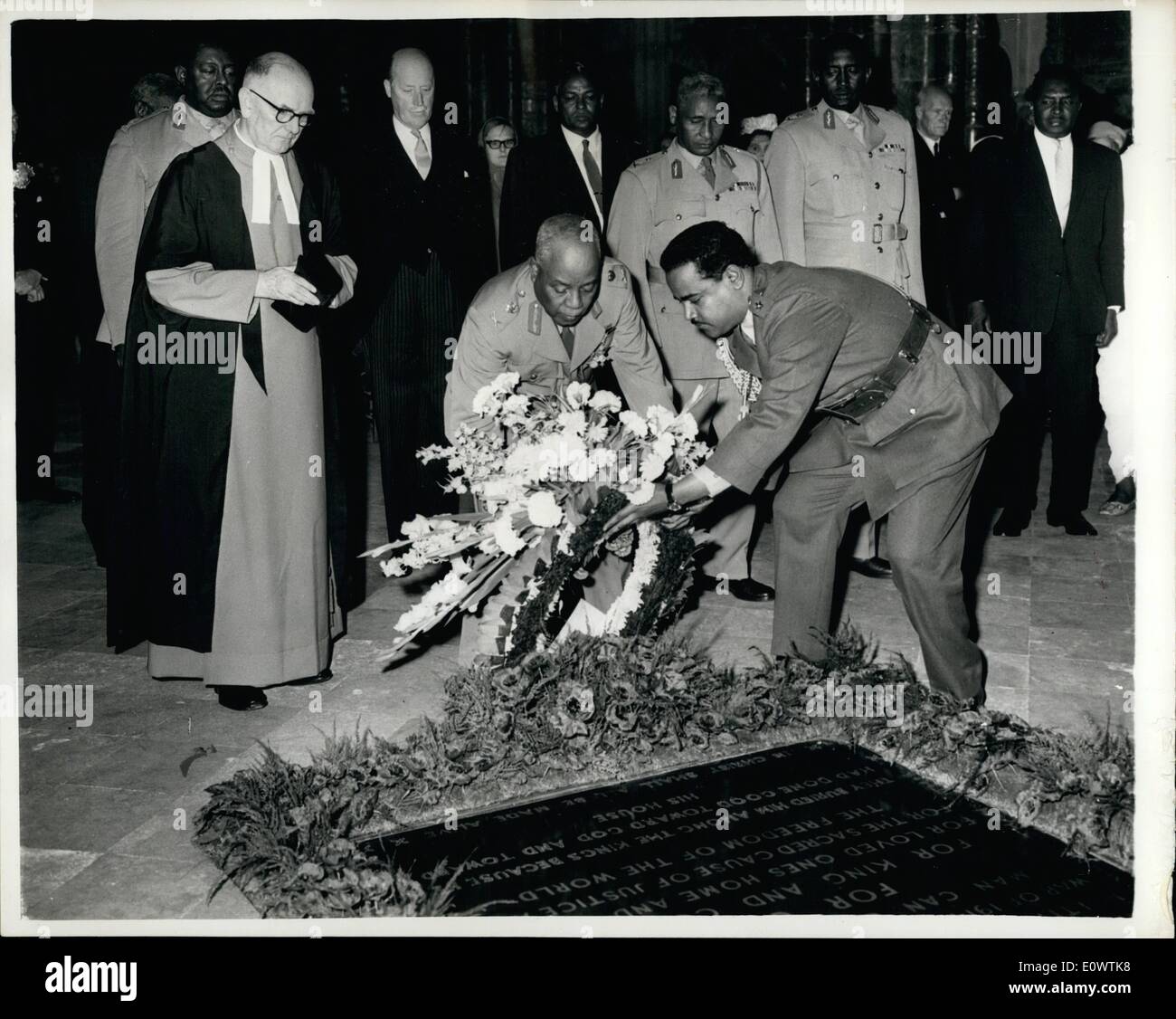 Apr. 04, 1964 - Abb Oud lays wreath on grave of unknown warrior: Westminister Abbey sub-Dean Rev. Canon Max Warren looks on as Sudan President Ibrahim Abb Oud lays a wreath on the tomb of the unknown warrior at the Abbey here today. President Abb Oud arrived in London earlier today at the start of a nine-day state visit to this country Stock Photo