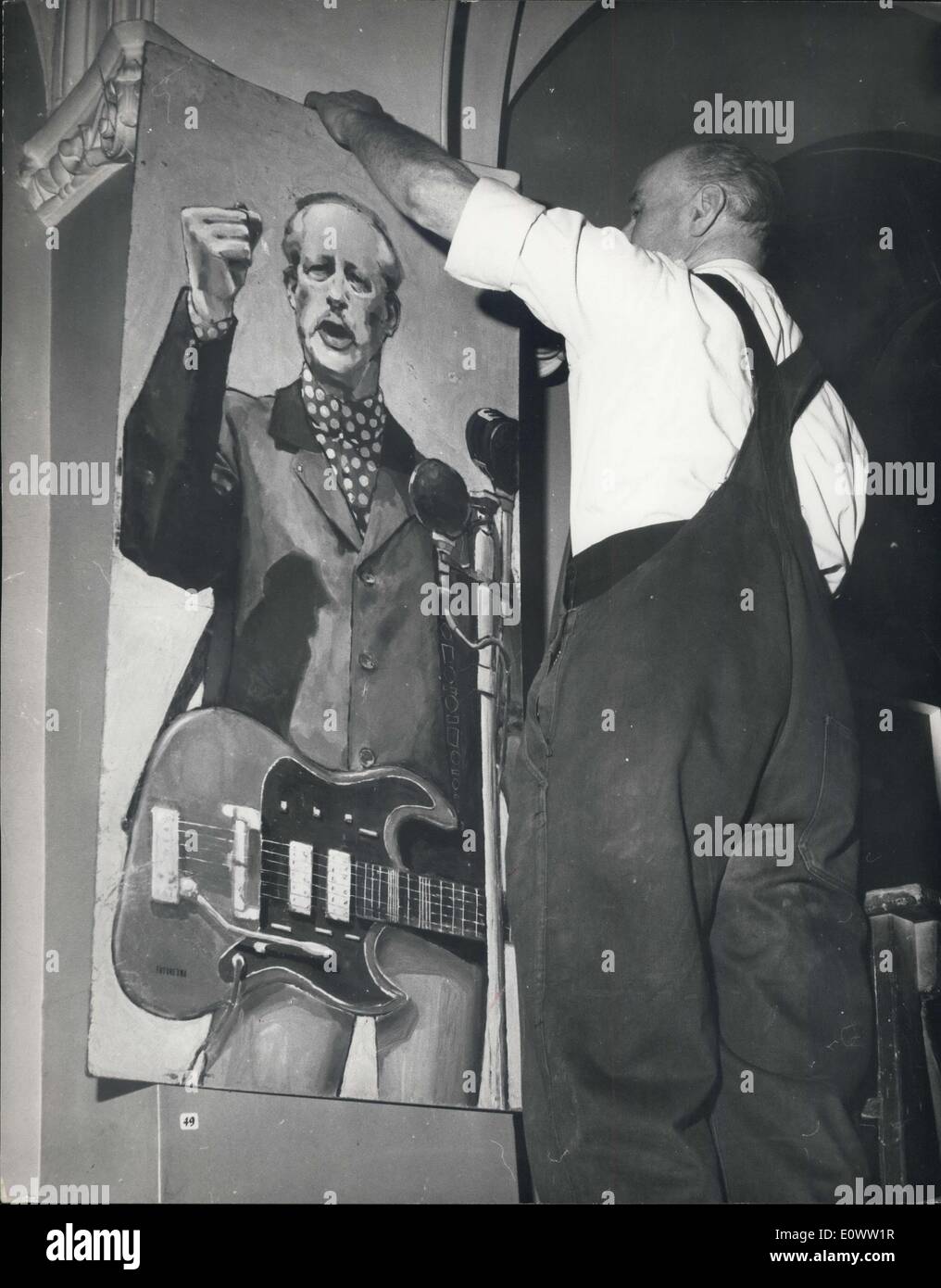 Apr. 22, 1964 - ''Mac the Mod'' ..... Ex-Premier Becomes A Beatle: Quite a stir has been caused in the ranks of the Tory party by the appearance in the East London Festival of Art, at Walthamstow, of a painting by 20 year old art student Petter Weevers, of former Prime Minister Harold MacMillan wearing a high-necked polka dot shirt, and a leather jacket, holding a Beatle type guitar. Some tories have referred to it as ''disrespectful'', but others think it rather amusing. Photo shows The painting of Harold MacMillan is hung at the East London Festival of Art today. Stock Photo