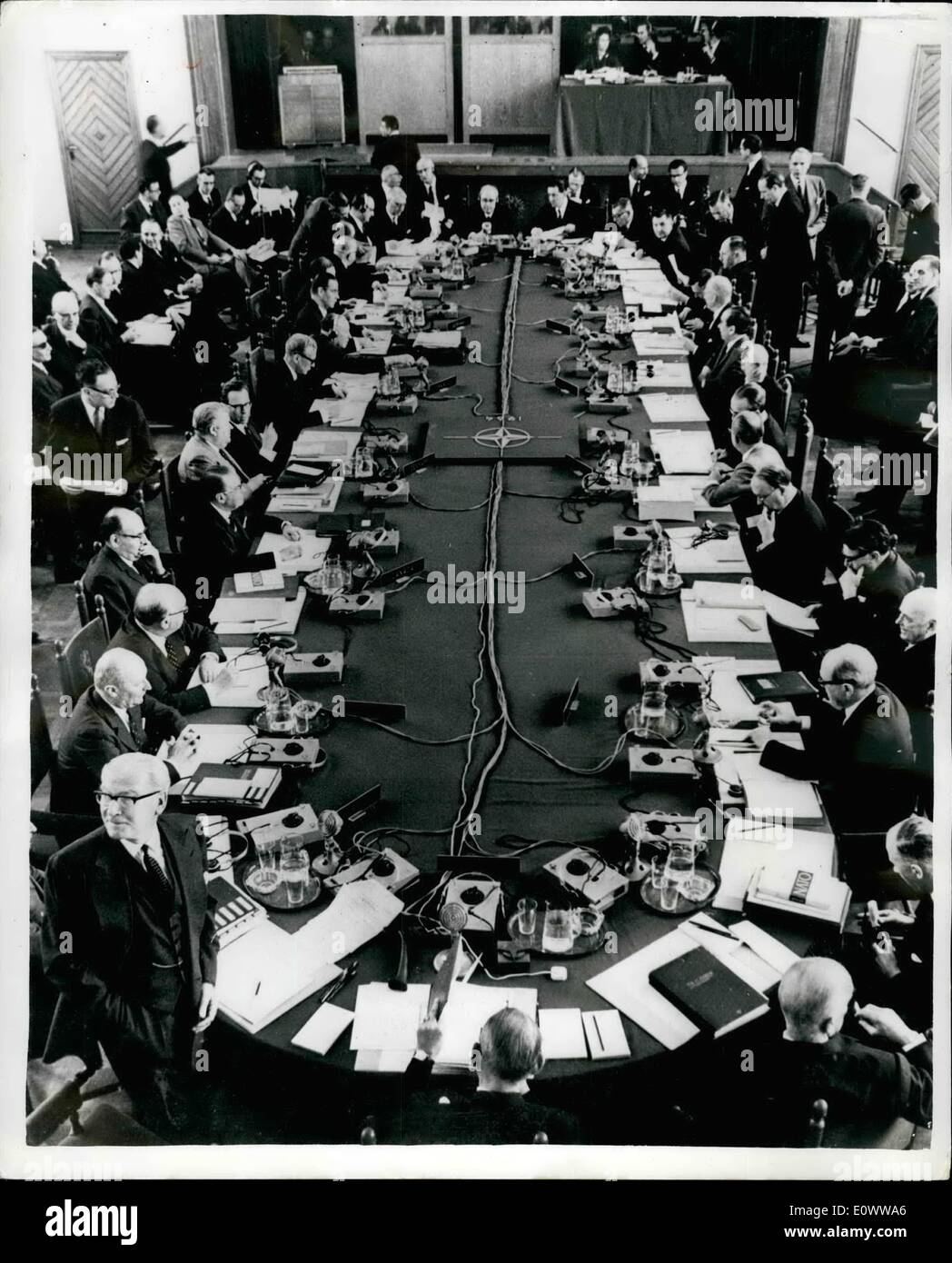 May 05, 1964 - N.A.T.O. Foreign Ministers Meet: The annual Spring Meeting of the North Atlantic Treaty Organisation Foreign Ministers is being held in Amsterdam. Among subjects to be discussed are trade with Cuba, the situation is Cyprus. Aden, Saigon. Photo Shows The Ministerial council in Session at the Hague today. British Foreign Secretary Mr. R.A. Butler can be seen on the right hand side. Stock Photo