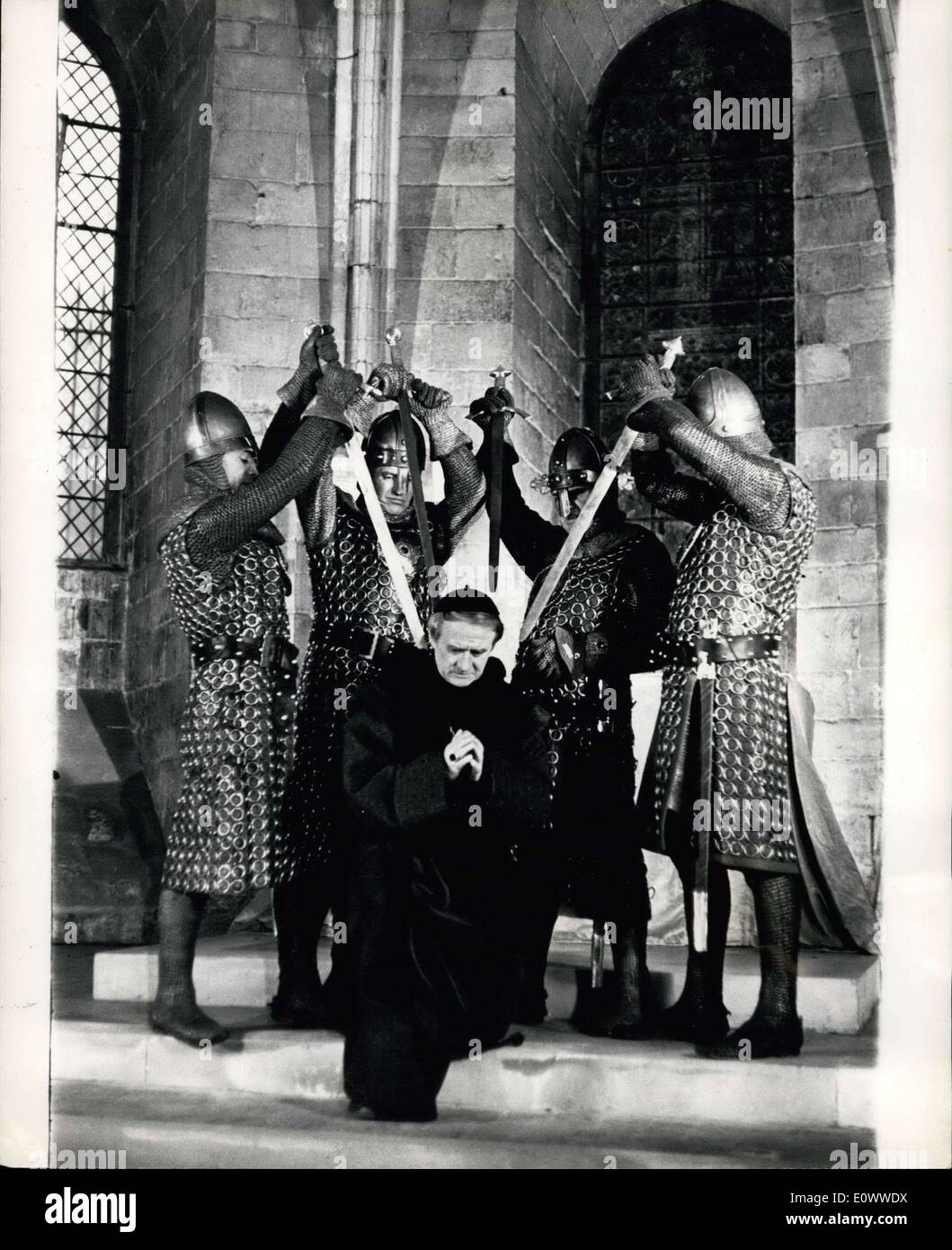 Mar. 16, 1964 - Death to the King's Enemy; On BBC Television on March 25th T.S. Eliot's play ''Murder in the Cathedral'' will be shown. The play which is being acted in Canterbury Cathedral, tells of the murder there in 1170, of Archbishop Thomas A. Becket, who was killed by the Knight's of King Henry II to and the bitter struggle between the two over the powers of church and state. Photo Shows Rehearsing the famous death scene for ''Murder in the Cathedral'' Thomas A Stock Photo