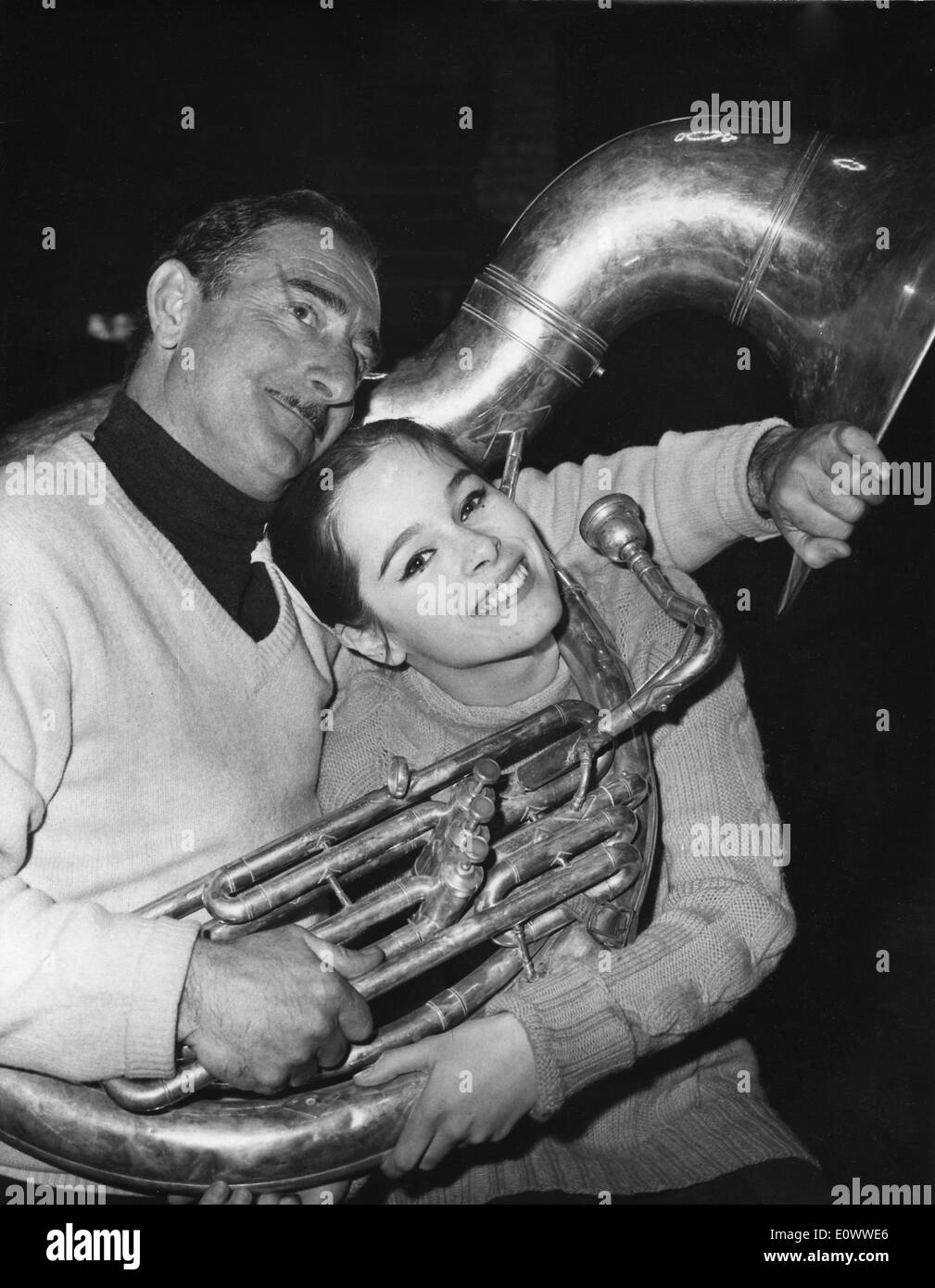 Mar. 17, 1964 - Paris, France - Daughter of the famous Charlie Chaplin, GERALDINE CHAPLIN records a radio show in Paris with guest-star, clown ACHILLE ZAVATTA, where he serenaded her with music. Stock Photo