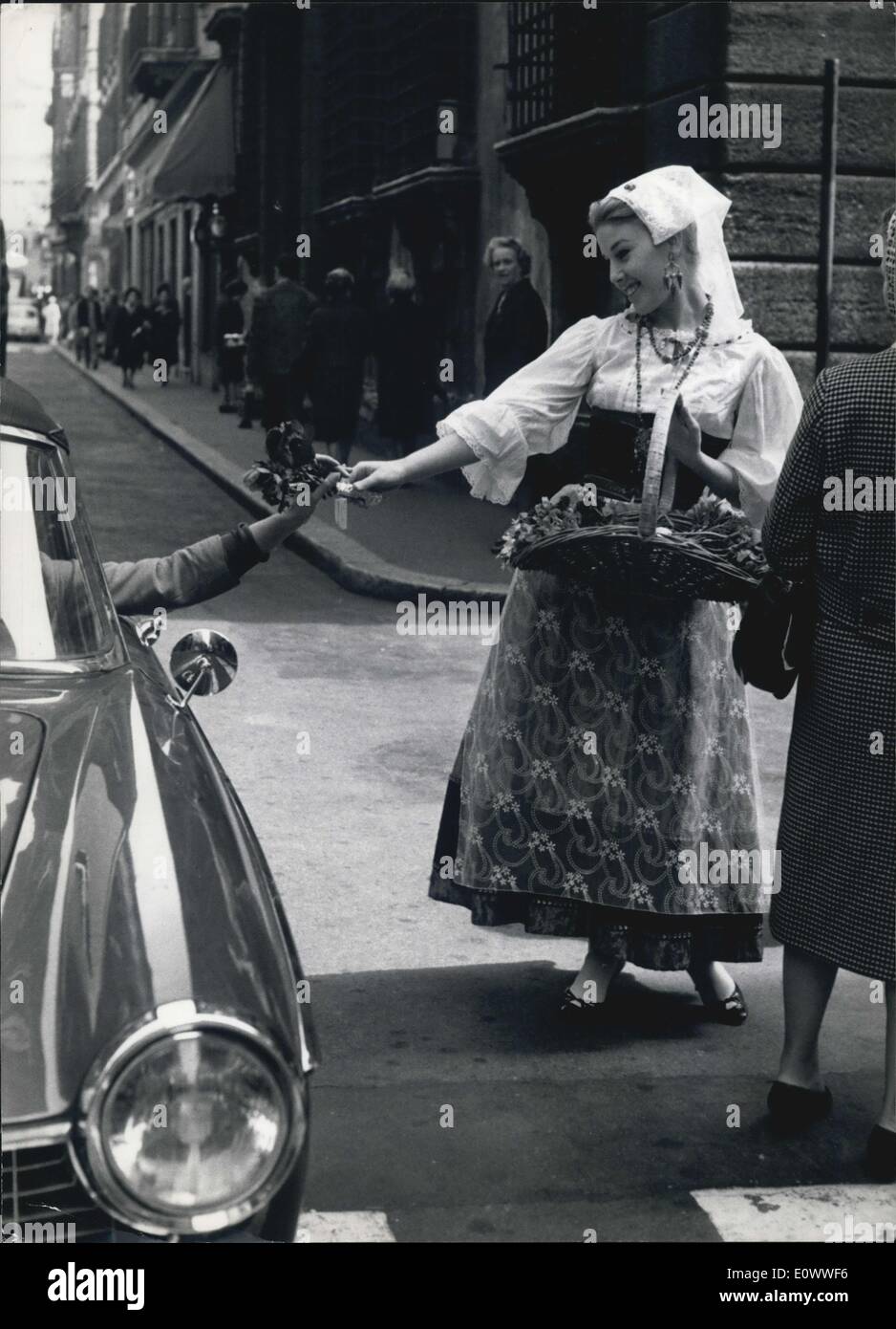 Mar. 26, 1964 - As it takes place every year for Easter week, a group of lovely ''ciociare'' (they are called the habitants of Ciociaria a little country near Rome) dresses with the original costumes of their country, offered flowers this morning to the ladies walking in via Condotti. Stock Photo