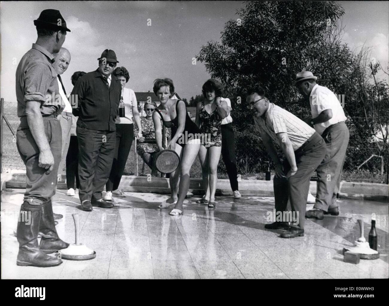 Jul. 07, 1964 - Provided For warm seasons......haven the curling shots from Teisnach - and Regental in Bavaria. In Patersdorf near Viechtach a Terrazzo-rank (Terrazzo - is polished concrete). Now it is possible play curling in the mid-summer dressed with a bathing-costumes. Stock Photo