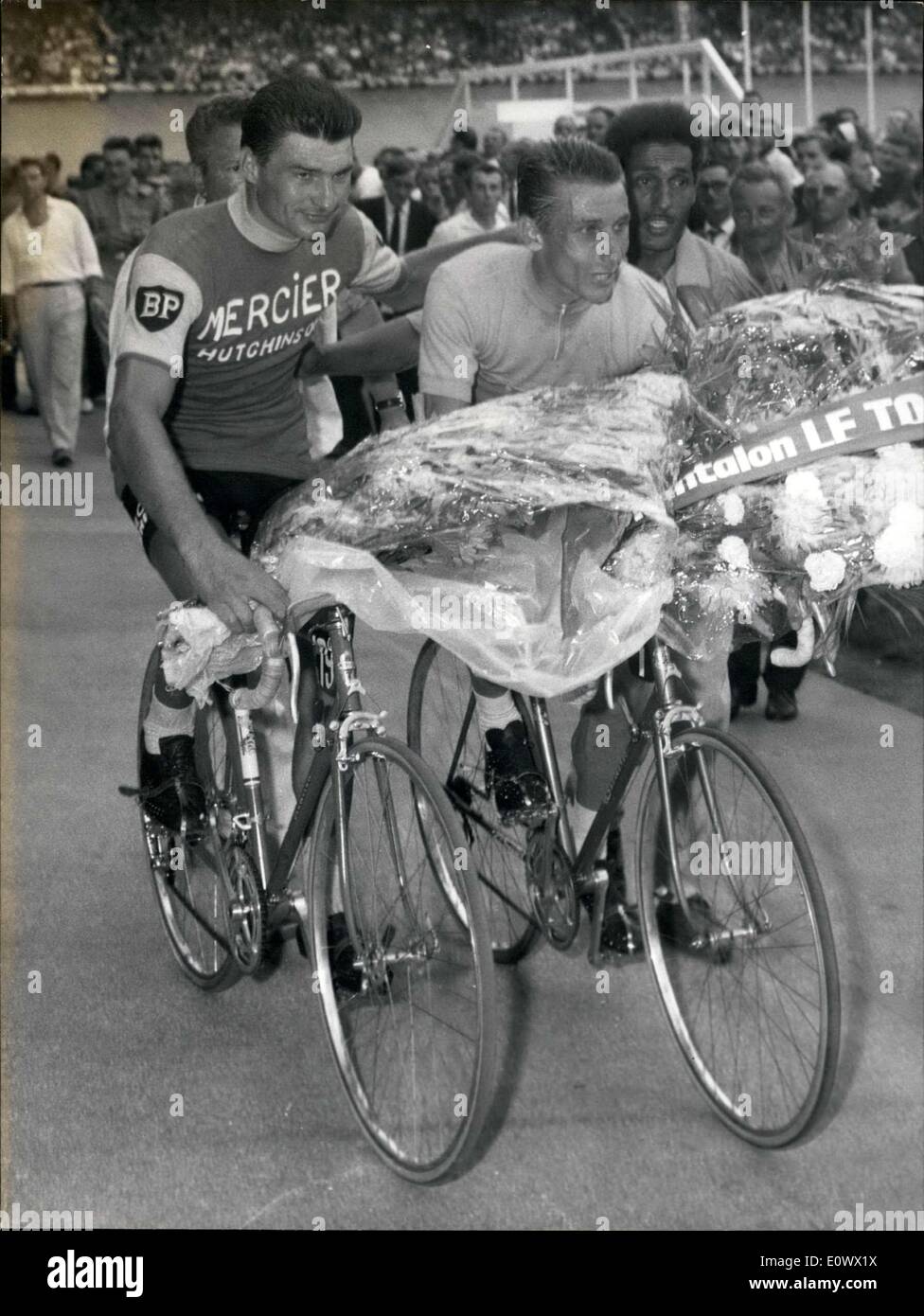 Jul. 14, 1964 - Raymond Poulidor and Jacques Anquetil take their victory lap after arriving to Parc des Princes. Stock Photo