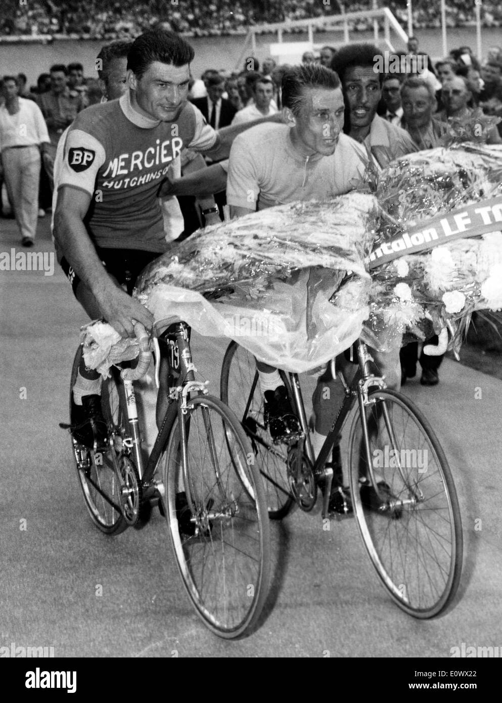 Jacques Anquetil and Raymond Poulidor riding by Stock Photo