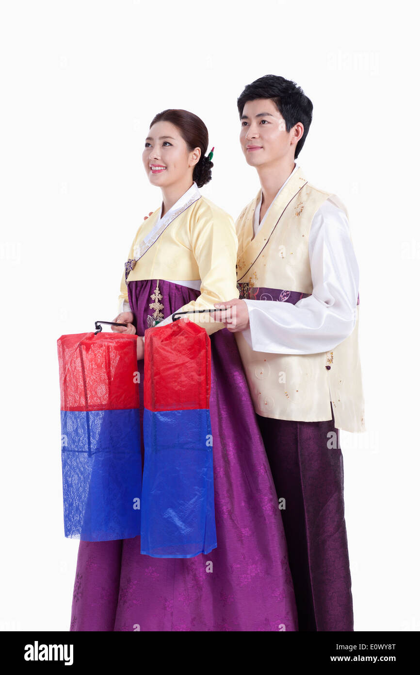 a couple wearing traditional Korean outfits Stock Photo - Alamy