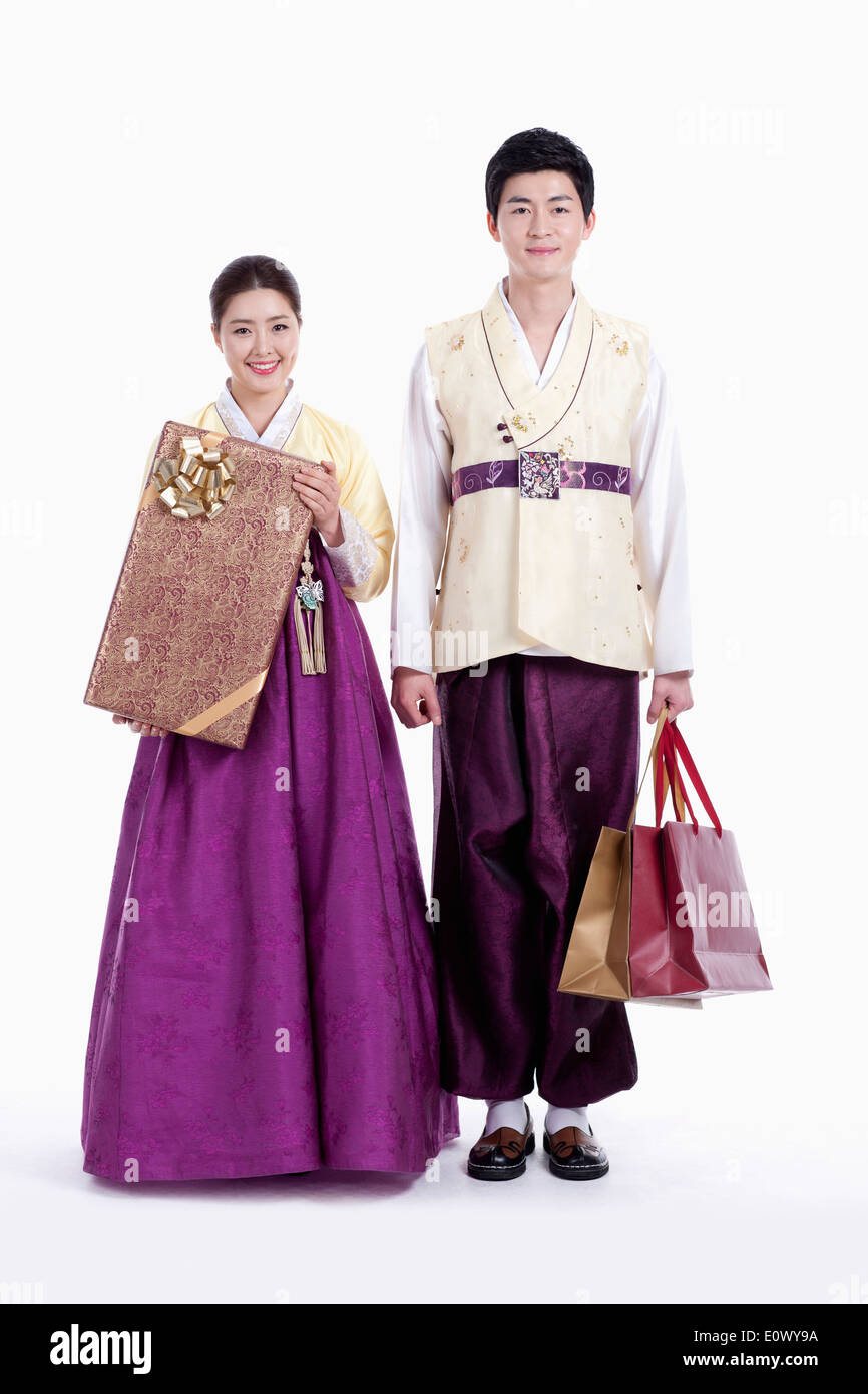 a couple wearing traditional Korean outfits Stock Photo - Alamy