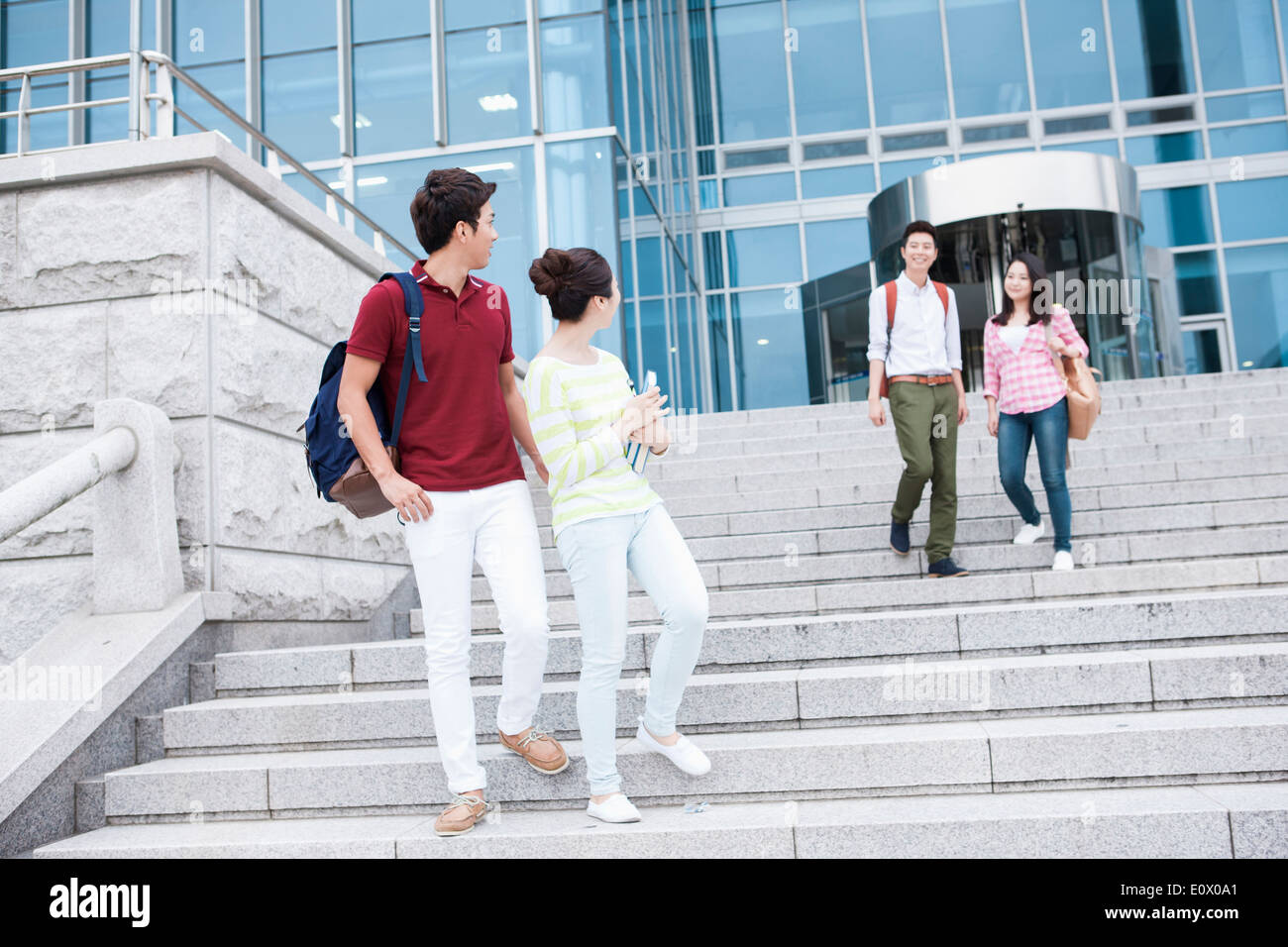 students walking down the stairs Stock Photo