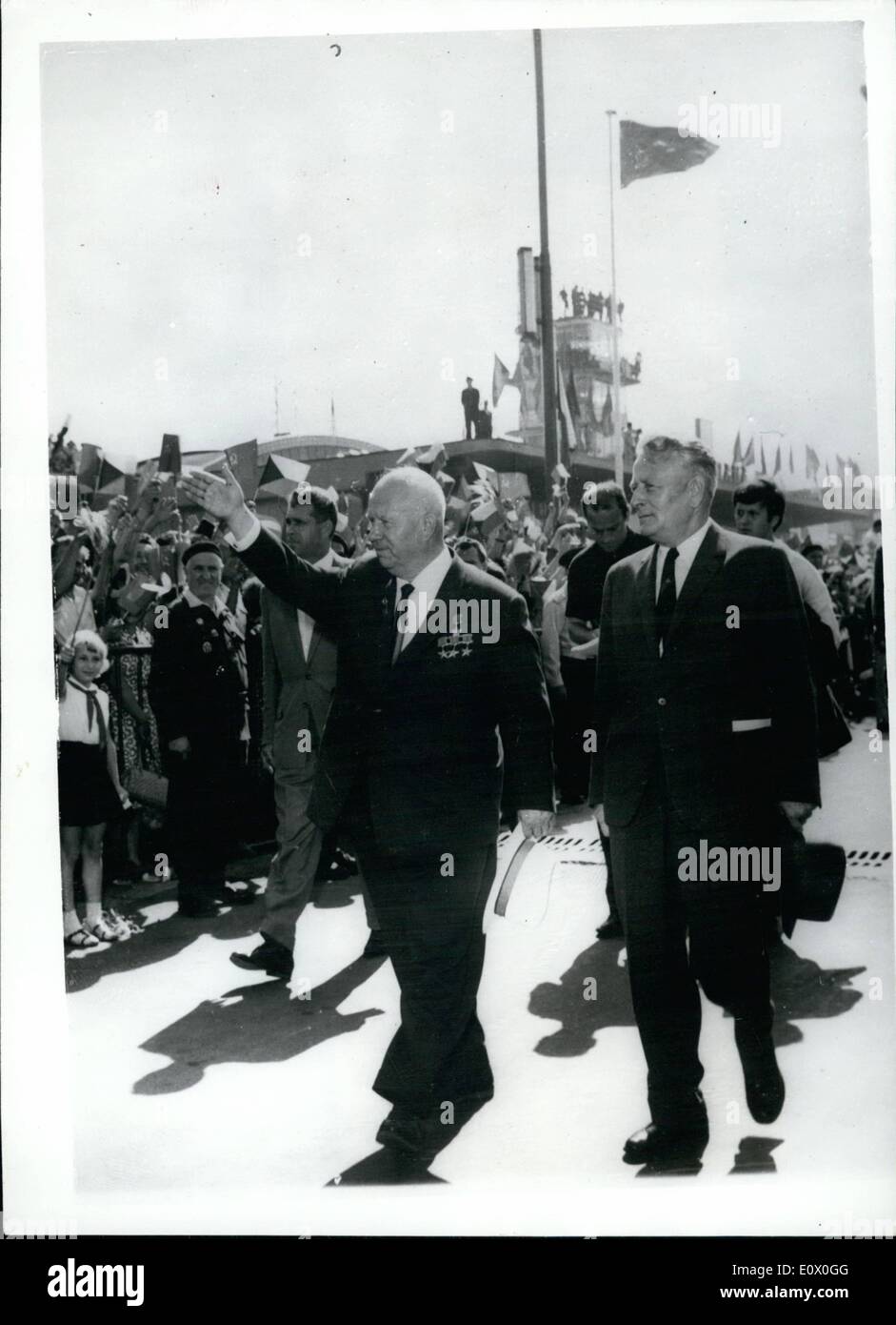 Sep. 09, 1964 - 1-9-64 Mr. Khruschev arrives in Prague. Headed by Mr. Khruschev a Soviet delegation arrived in Prague to attend the celebrations of the 20th Anniversary of the Slovak National Uprising, the chief assembly being at the Banska Bystrica, Central Slovakia. Keystone Photo Shows: Mr. Khruschev acknowledges the greeting as he walks with Czech President A. Novotny on his arrival at Prague Ruzyne airport. Stock Photo