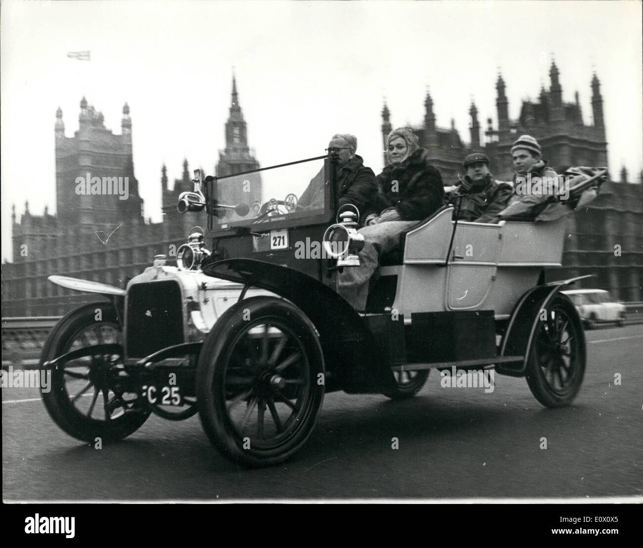 Nov. 11, 1964 - Veteran Cars Take Part In Commemoration Run Frown Hyde Park To Brighton: A record 283 Veteran cars, built before 1905, were entered for the Royal Automobile Club's annual London to Brighton run, which started from Hyde Park in this morning. Photo Shows One of the Veteran cars, a 1904 Talbot, entered by H. Rose is seen passing over Westminster Bridge on its way to Brighton this morning. Stock Photo