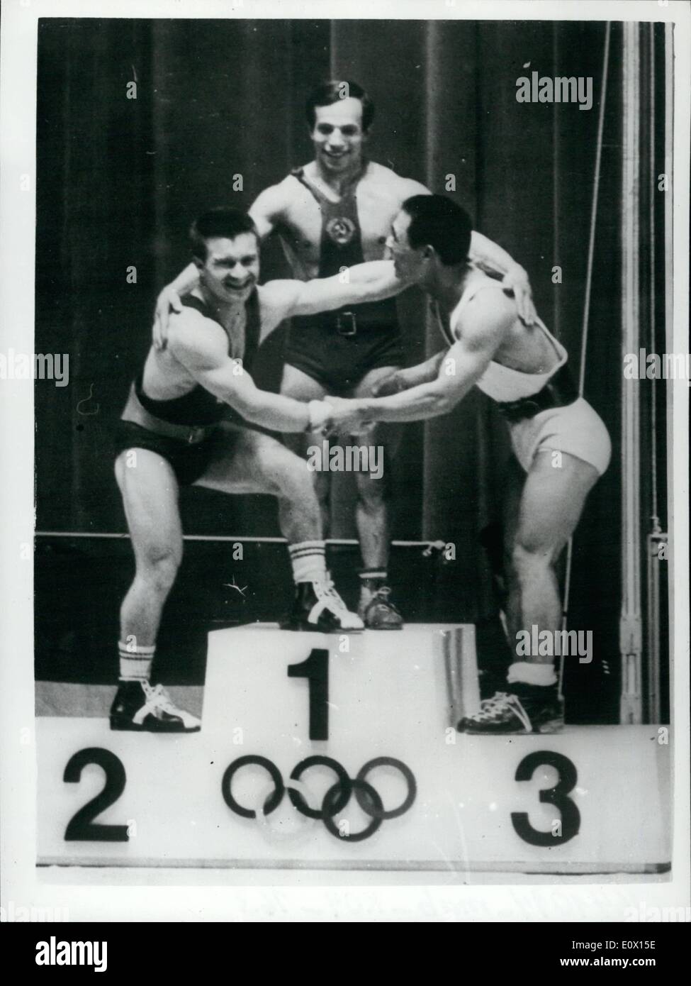 Oct. 10, 1964 - Olympic Games In Tokio USSR Weightlifter Wins First Gold Medal: Photo shows. Medalists at the Olympic weightlifting competition at the Shibuy Public Hall, Tokio, congratulate each other. They are (L. to R.) Imre Foldi, of Hungary (silver medal), Alexei Vakhonin, of the U.S.S.R. (Gold Medal) and Shiro Ichinoseki, of Japan (Bronze Medal). Vakhonin broke the world record with 142.4 kgs. Stock Photo
