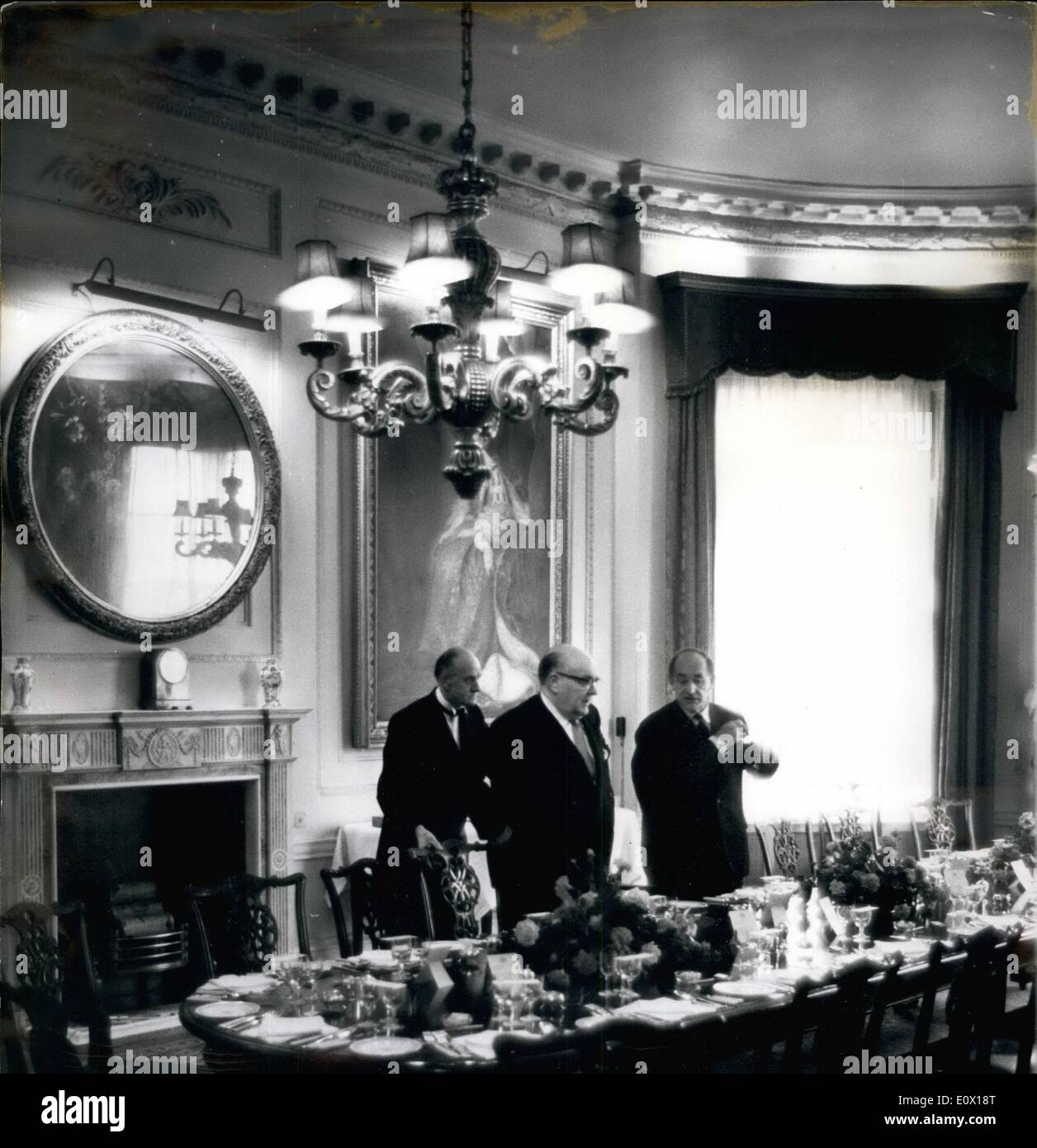 Dec. 12, 1964 - In the elegant room where yesterday's Big decison was made: In this pleasant and elegant setting yesterday a difficult decision was being taken. The setting is rarely photographed dining room of No. 1 Carlton Gardens, official London residence of Britain's Foreign Secretary. The decision concerned the Congon. How to save the 700 Europeans and Asians - including 42 from Britain and the Commonwealth still in rebel - held territory. The two principal decision makers in this question were the Foreign Secretaries of Belgium and Britain, Paul - Henri Spaak and Patrick Gordon Walker Stock Photo