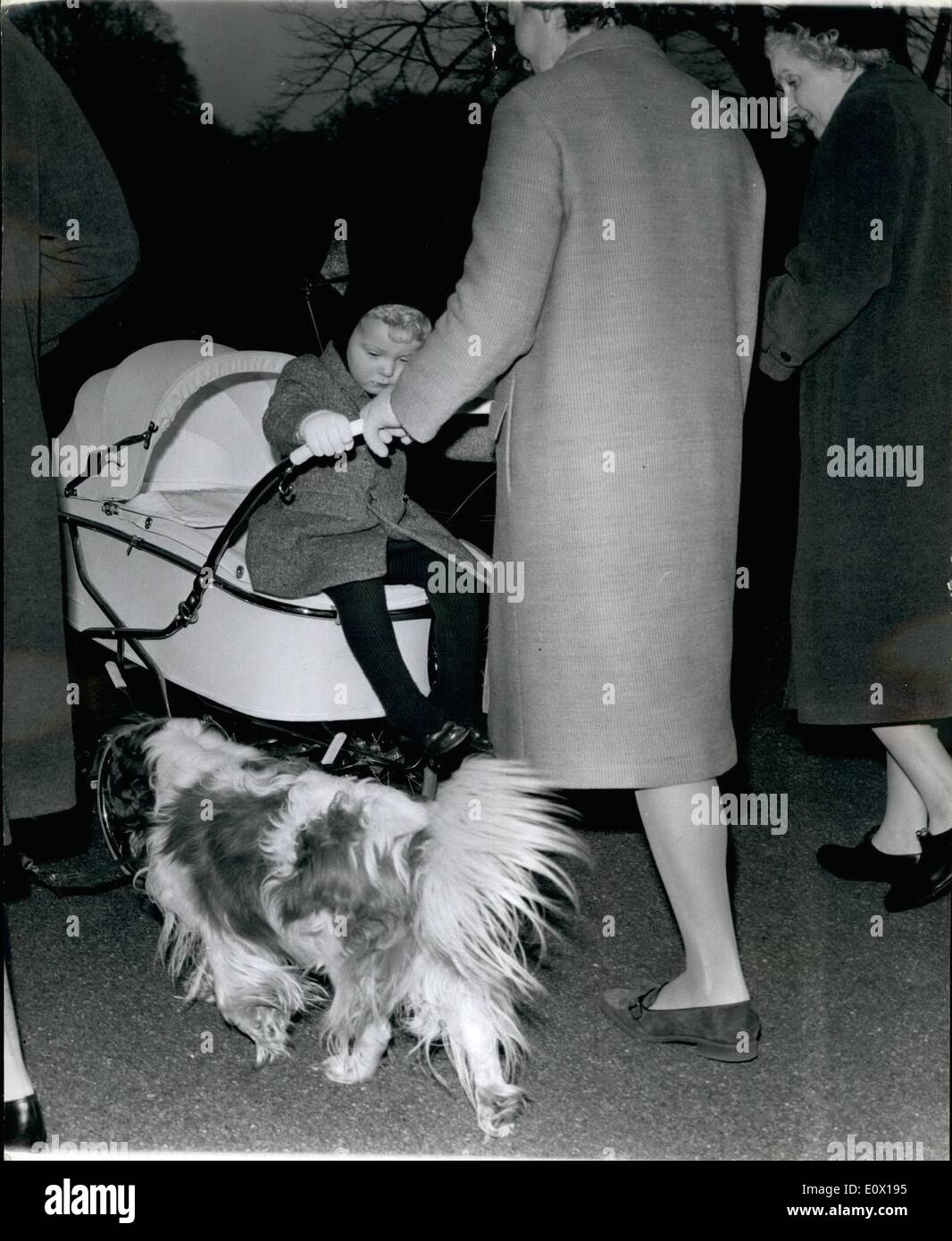 Dec. 12, 1964 - A Park outing for the young Earl of ST.Andrews.: George Philips Nicholas. the Earl of ST. Andrews, 2-year Ã¢â‚¬â€œold son of the Duke and Duchess of Kent, was to be seen out walking in Kensington Gardens. Photo Shows a little Leg-weary after his walk the young Earl hitohes a ride on his sister's (Helen Marina Lucy Windsor) pram. Stock Photo