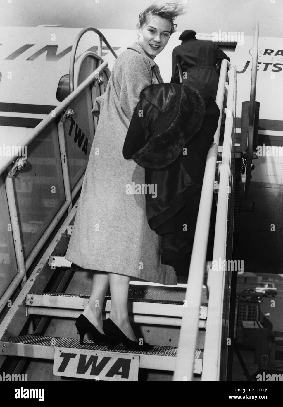 Actress Hope Lange boarding a TWA flight Stock Photo