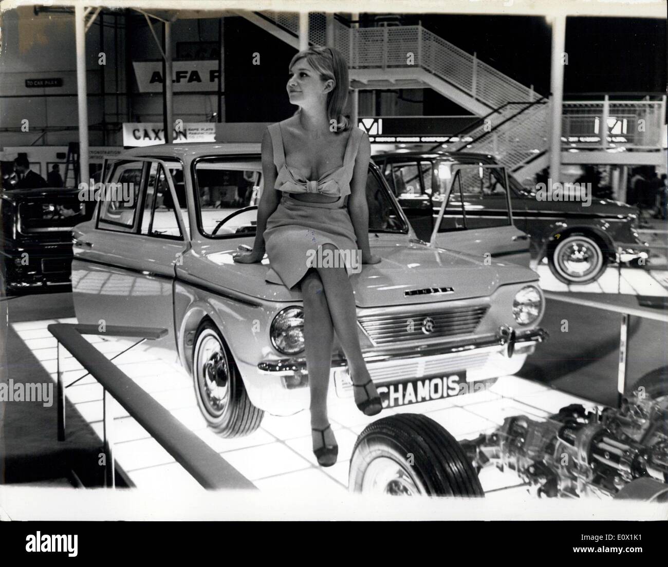 Oct. 21, 1964 - At the Motor Show. Photo Shows: Shapely Gilda Sherwin poses on the bonnet of the new Singer Chamois car at the Motor Show, which Princess Margaret will open today. H/Keystone Stock Photo
