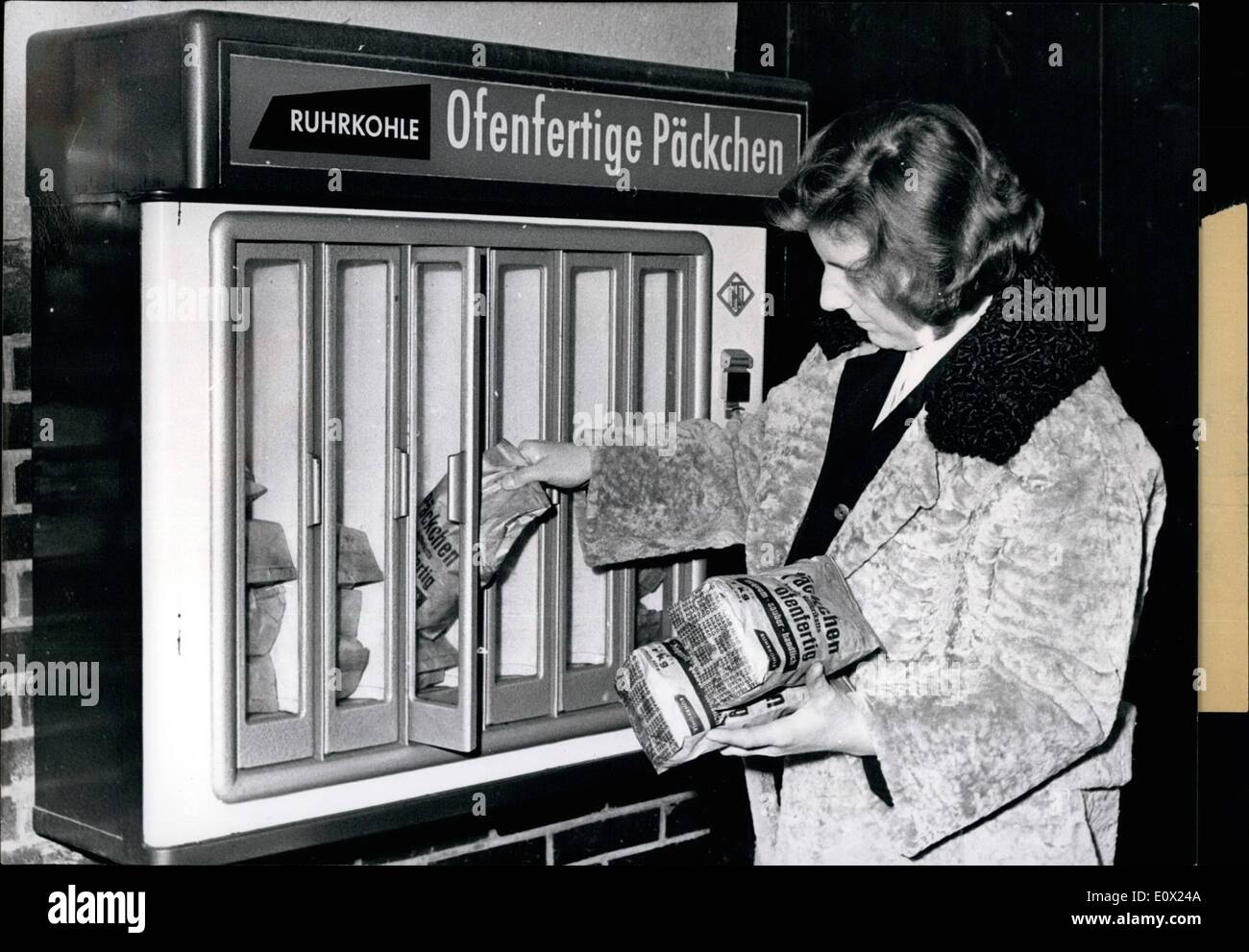 Nov. 11, 1964 - Coal for sale: Slot-machines have been set up in some german towns for the sale of coal in handy portion bags. Late housewives and lazy bachelors can shop there 24 hours a day to get a warm home if thex dont have a cellar or dont like to get dirty hands packing up heating material. Stock Photo