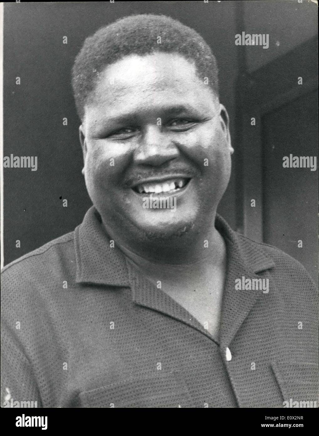 Feb. 22, 1965 - The Man Who Waits in a Waffle Hut... Joshua Nkomo - Detainee at GonaKudzingwa... GonaKudzingwa - situated 400 miles from Salisbury in southern Rhodesia - is where 450of the country's best educated Africans are held in a restriction camp... The Government have sent them there for terms ranging from one to four years because they regarded them as a danger to law and order. Leader of the detained men is Joshua Nkomo leader of the baned African People's Union. Some of the detainee have hteir own huts - while the others live in dormitories Stock Photo