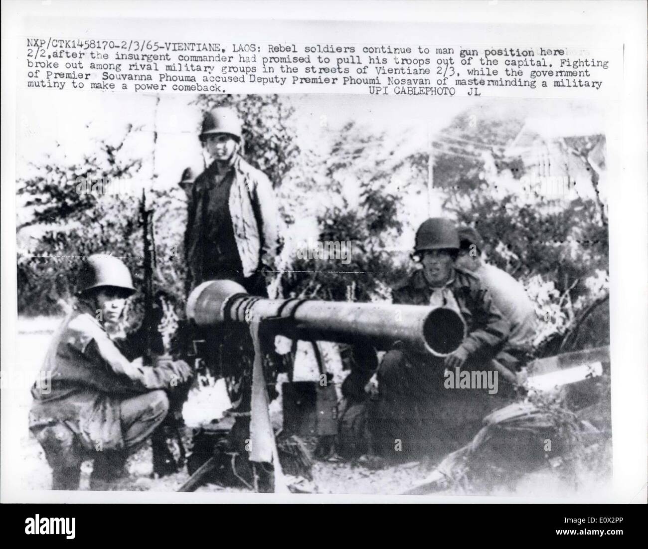 Mar. 02, 1965 - Vietiane, Laos: Rebel soldiers continue to man gun position here 2/2, after the insurgent commander had promised to pull his trooos out of the capital. Fighting broke out among rival military groups in the streets of Vientiane 2/3, while the government of Premier Souvanna Phouma accused Deputy Premier Phoumi Nosavan of masterminding a military munity to make a power comeback. Stock Photo