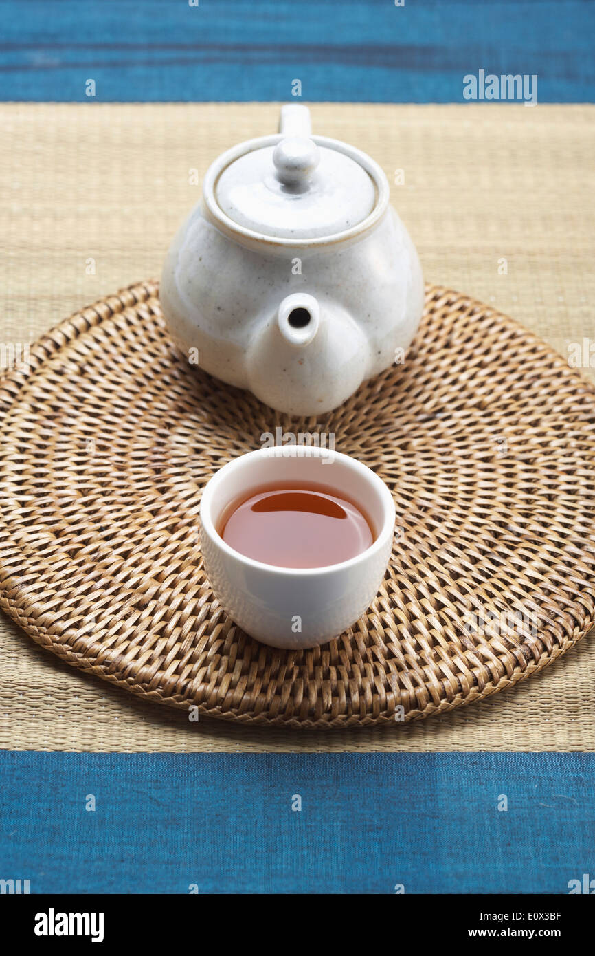a teapot next to a cup of traditional Korean tea Stock Photo Alamy