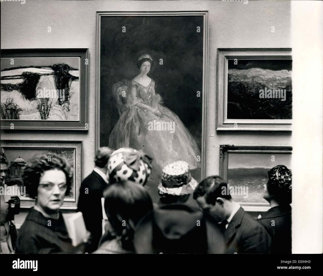 Apr. 04, 1965 - Private View Of The Royal Academy Summer Exhibition. Photo shows Visitors at today's Private View of the Royal Academy Summer Exhibition - looking at a new portrait of H.M. The Queen - by London artist, Peter Greenham. Stock Photo