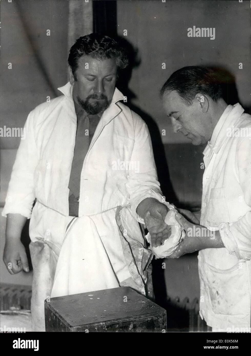 Jun. 06, 1965 - A Wax Statue For Peter Ustinov Italian sculptor in Paris Barbieri is preparing at the famous Grevin Museum in Paris, the wax statue of famous actor Peter Ustinov. ops:- Sculptor making the statue of Peter Ustinov, in the presence of the model. Stock Photo