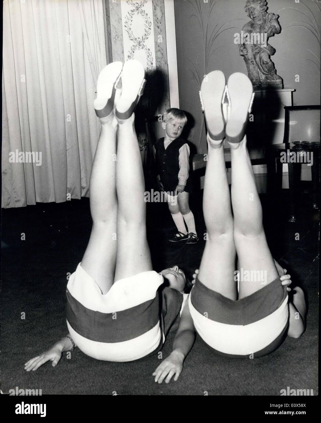 Apr. 07, 1965 - Isometrics - For Slimming Ankles.. Three Year Old Clive Looks In: Six lovely young ladies were to be seen demonstrating the art of Isometrics - the form of exercising first used by the United States Navy for general body toning - and now found to be ideal for ankle slimming - at the Ballroom Lounge of the Dorchester Hotel - today. Sue Tulloh the 23 year old wife of the famous Bruce Tulloh gave a talk on how she managed to take off three stone by use of the exercise Stock Photo
