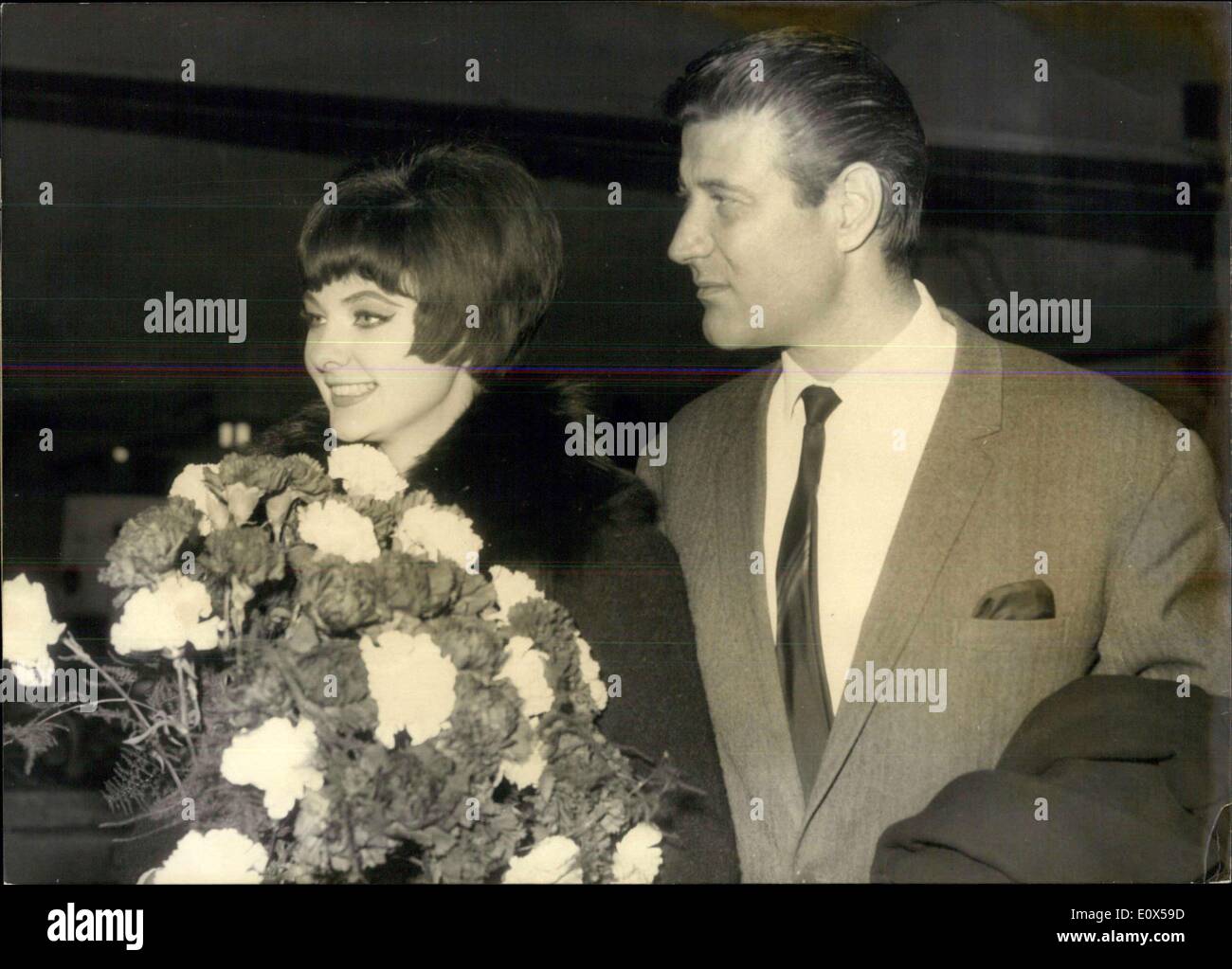 Apr. 10, 1965 - With a ''New Look''... Mandy Rice-Davis arrived at Hamburg (9.4). The London play-girl want to sing in a night-club at the ''Reeperbahn''. She will get for three nights DM 4000.-. Photo Shows Mandy with her fiance Baron Peter Cervello. Stock Photo