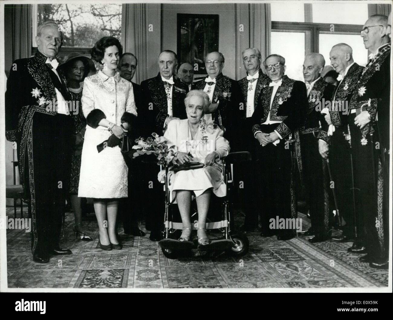 Apr. 12, 1965 - A delegation of the French Institute gave 89-year-old Queen Elizabeth the official title of a ''foreign associate'' of the Fine Arts Academy and John Rockefeller's seat. Queen Fabiola attended the reception at the Styvenberg Chateau near Brussels. Albert Laprade led the reception. Stock Photo