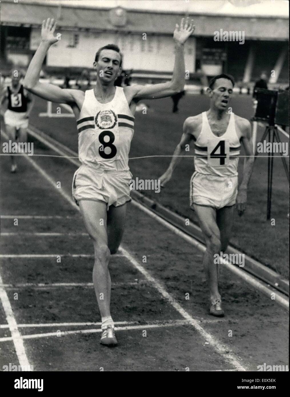 Jun. 06, 1965 - The British Games At The White City. Photo Shows:- The finish of the Two Mile invitation event showing D. Graham, of Great Britain (No.8) winning the event and setting up a new United Kingdom record, with E. Allonsius of Belgium (No. 4) who was second. Graham's time was 8 min. 33.8 secs. Stock Photo