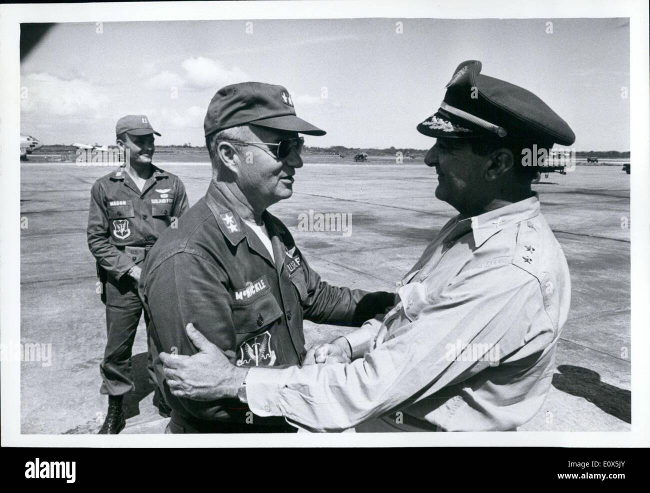 May 05, 1965 - Dominican Civil War: Maj.Gen.McMickle, Us Air Force in ''abrazo'' with one of the OAS officers at the landing of Stock Photo