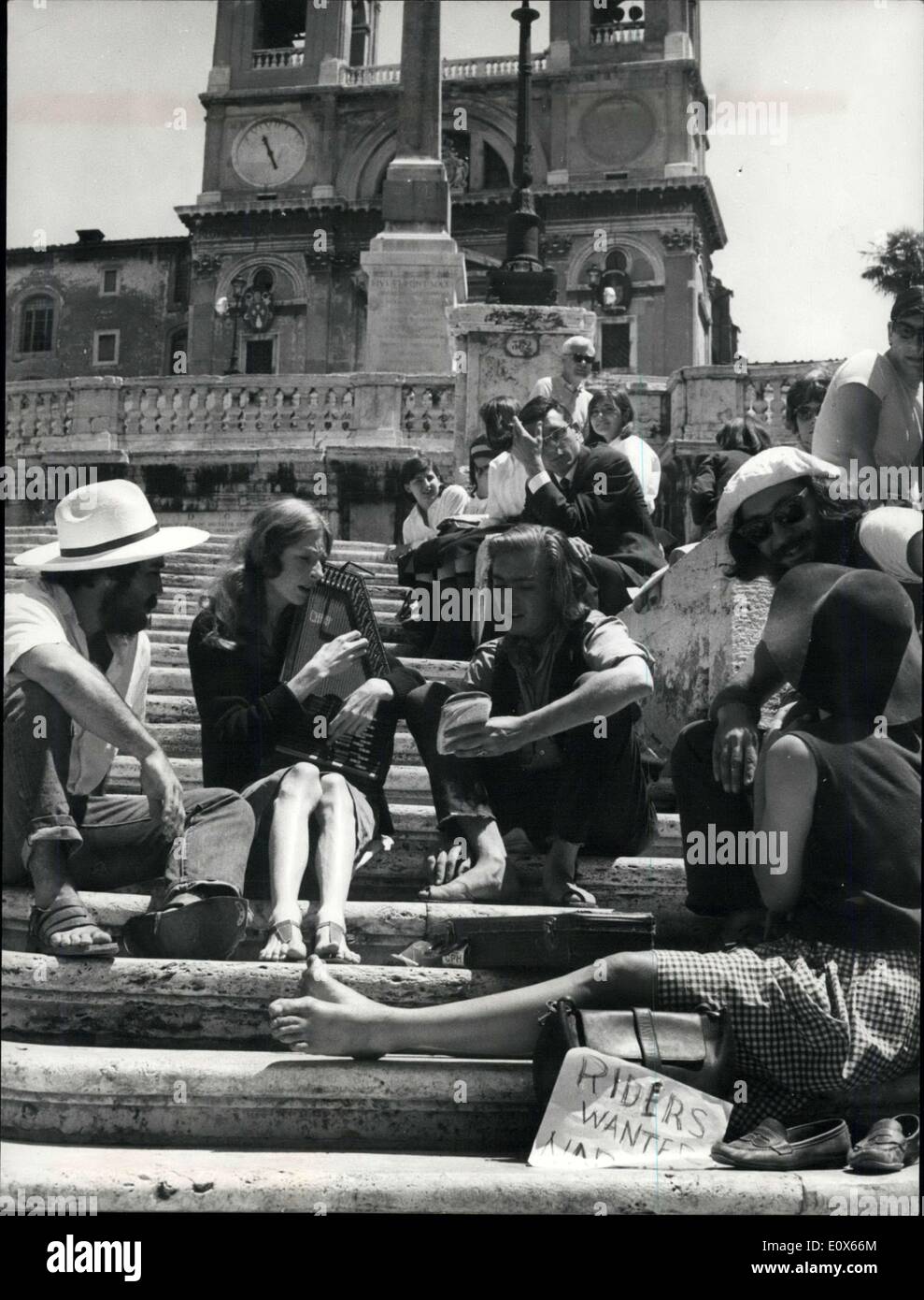 Jun. 18, 1965 - Extravagant kind of tourists seen this morning on the famous Steps of Piazza di Spagna; are young engish girls and boys who came to see Rome travelling by motor-cycles or by 'autostop' and make here in town any sort of work; most of them are painter and some models. Stock Photo