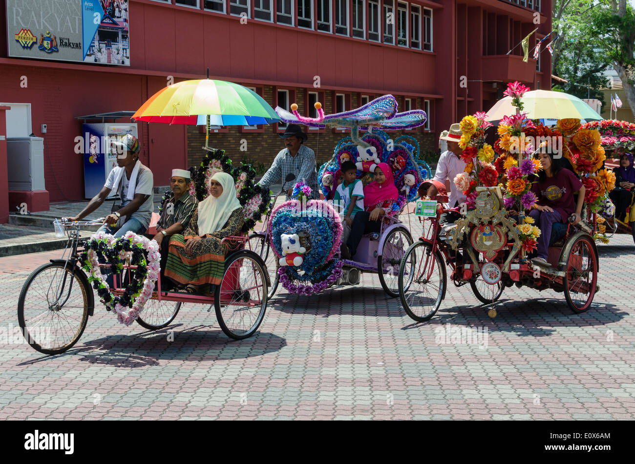 Highly decorated Trishaws in the Malaysian city of Malacca Stock Photo