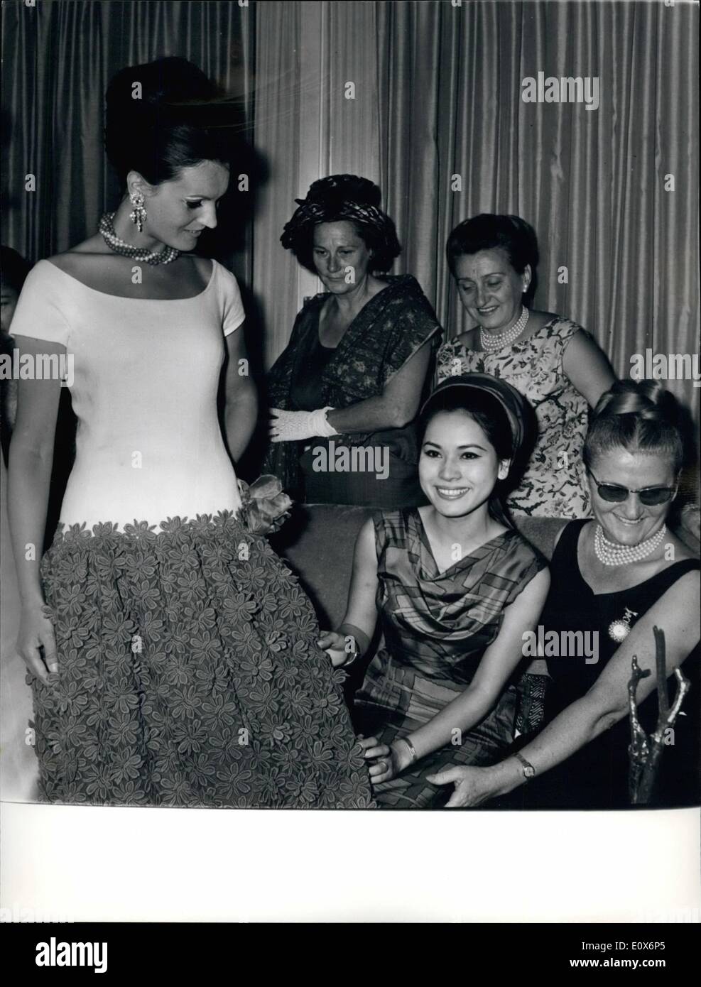 Jul. 07, 1965 - Rome President Sukarno's new wife Visit Roma: Ratna Sari Dewi, 24, the beautiful Japanese wife of Dr. Sukarno, the Indonesian President arrived yesterday on her first visit to Rome, Madame Sukarno, one of the President's three wives, is here to a little stay. Photo shows Madame Sukarno pictured on the atelier of Fontana sister, Whil assists to a defile. Stock Photo